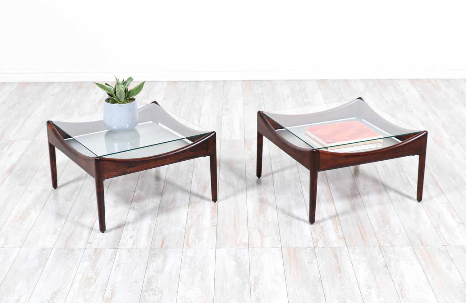 Kristian Vedel rosewood coffee/side tables for Søren Willadsen.

________________________________________

Transforming a piece of Mid-Century Modern furniture is like bringing history back to life, and we take this journey with passion and