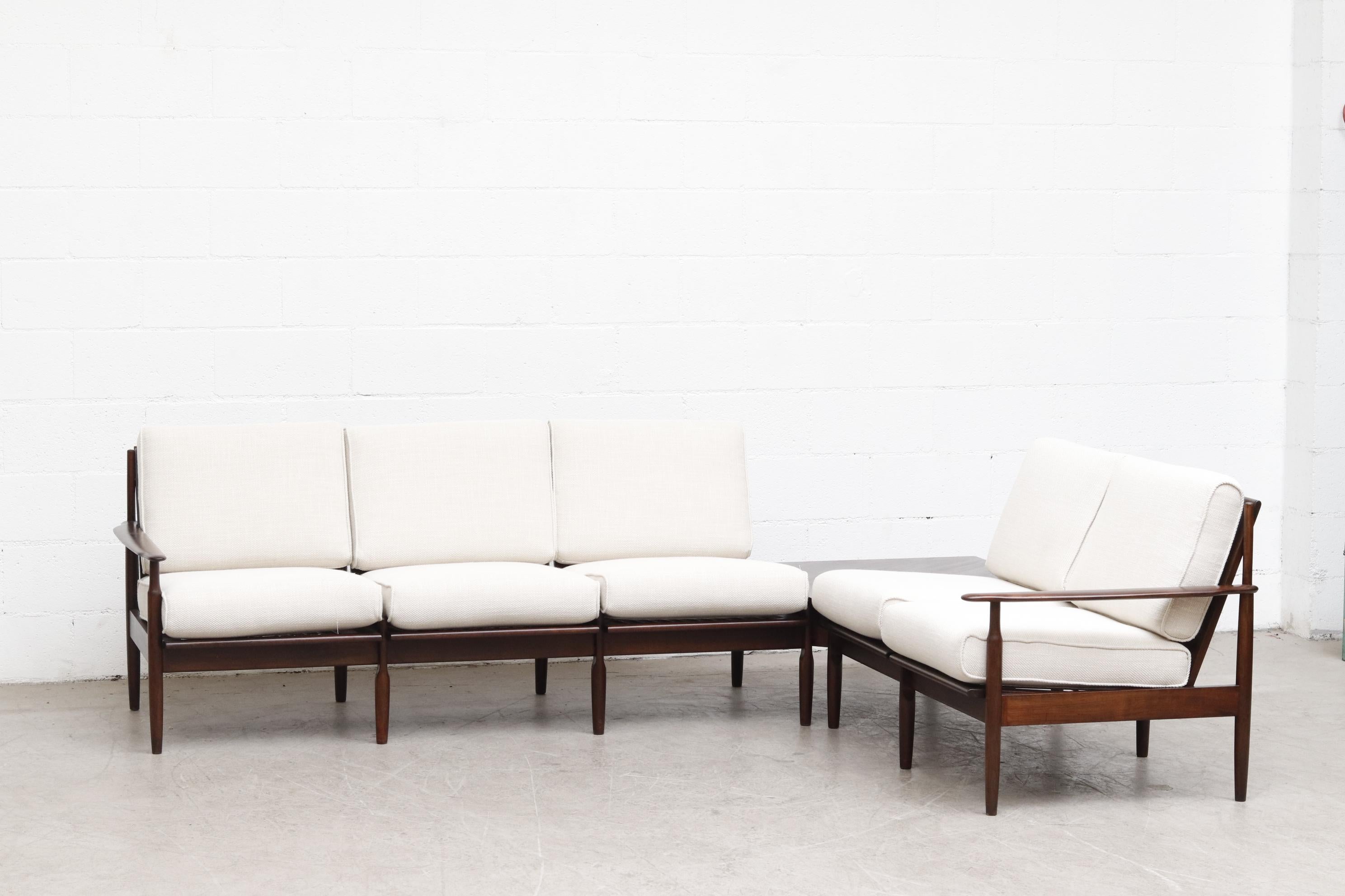 Kristian Vedel style sectional sofa set with incorporated side table. The table screws securely to the two sofa pieces. Ships in pieces. Three-seat is 71.5 W x 31.5 D, two-seat is 49.5 W x 31.5 D, table is 31.5 x 31.5 and disassembles into 3 pieces.