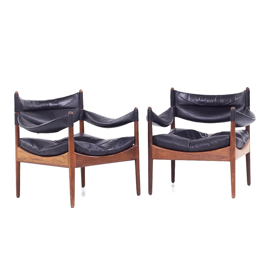 Kristian Vedel for Willadsen Møbelfabrik Modus Mid Century Danish Rosewood and Leather Lounge Chairs - Pair

Each lounge chair measures: 28 wide x 26 deep x 26 high, with a seat height of 14 and arm height/chair clearance 18 inches

All pieces of