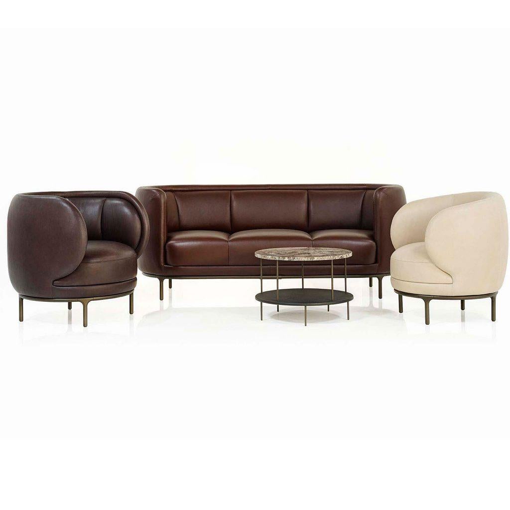 3 seater (25620) in the Anthrazit velvet with powder coated bronze legs. We would like to order 3 of the smaller pillows 

Rotation, turning, return, these are the meanings of the Spanish word Vuelta. The backrest rotates playfully around the