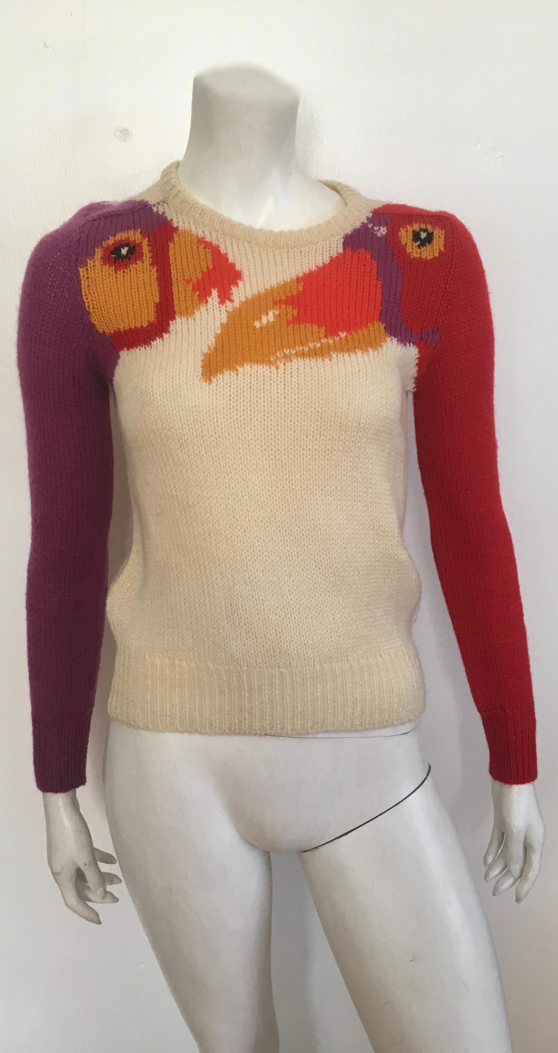 Krizia Maglia 1980s two exotic birds hand knit pullover sweater is an Italian size 38 and fits like a small, size 2 & 4.  These iconic sweaters were designed by Mariuccia Mandelli.  The Krizia Atelier was across the street from the Milan Zoo so I