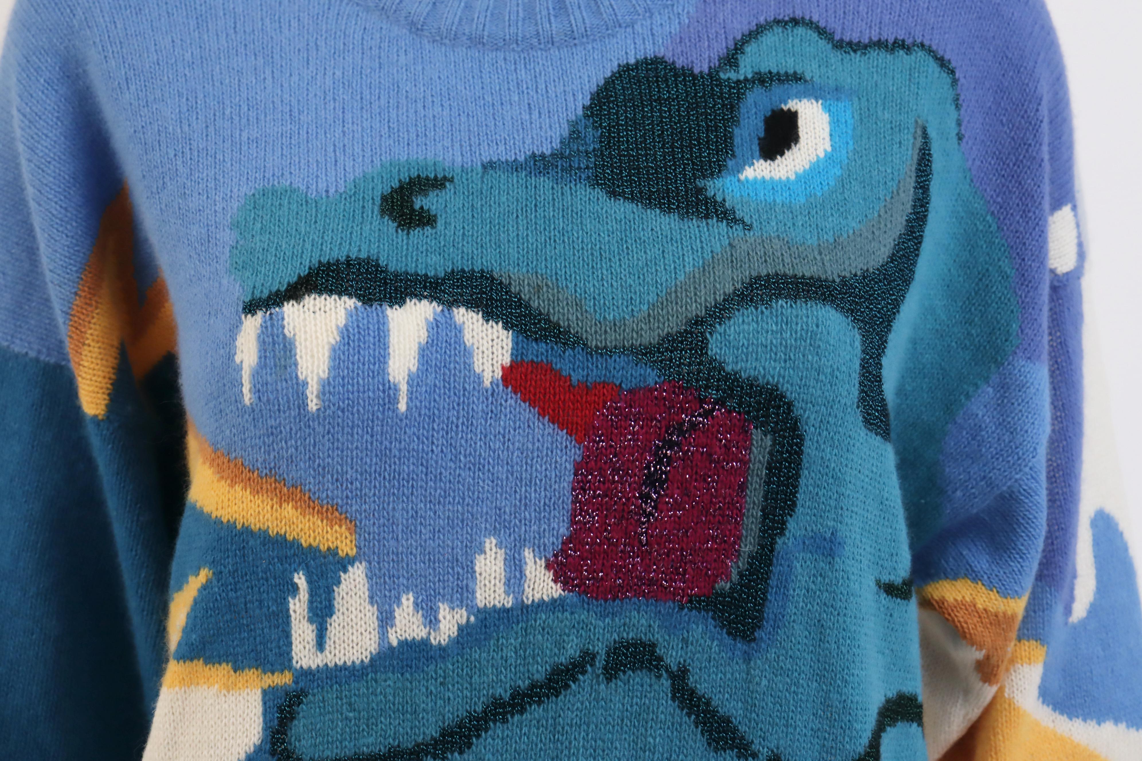 I love Vintage Krizia Animal Sweaters!!!!  This Vintage 80's KRIZIA Dragon or Dinosaur Sweater is no exception.  Vibrant colors and made from wool, angora & rayon.  You will love it!  

 Designer:  Krizia

Condition:  Excellent

Size:  fits like a
