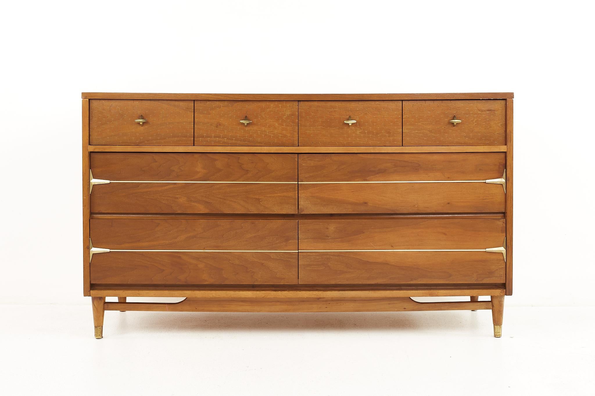 Kroehler Impression mid century walnut and brass 6 drawer lowboy dresser

This dresser measures: 54.5 wide x 18 deep x 31.5 inches high

All pieces of furniture can be had in what we call restored vintage condition. That means the piece is