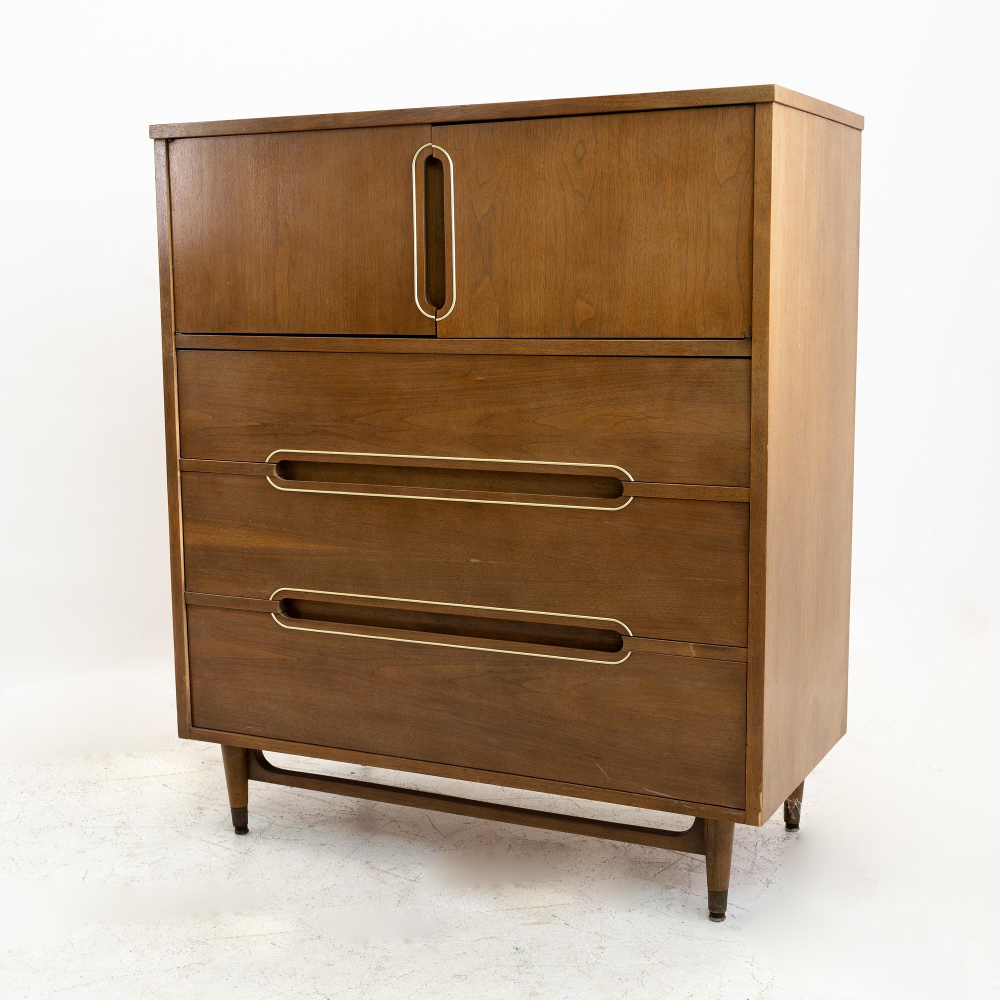 Kroehler mid century walnut & brass 5 drawer highboy dresser.
This dresser is 38.75 wide x 19 deep x 44.75 inches tall

All pieces of furniture can be had in what we call restored vintage condition. That means the piece is restored upon purchase