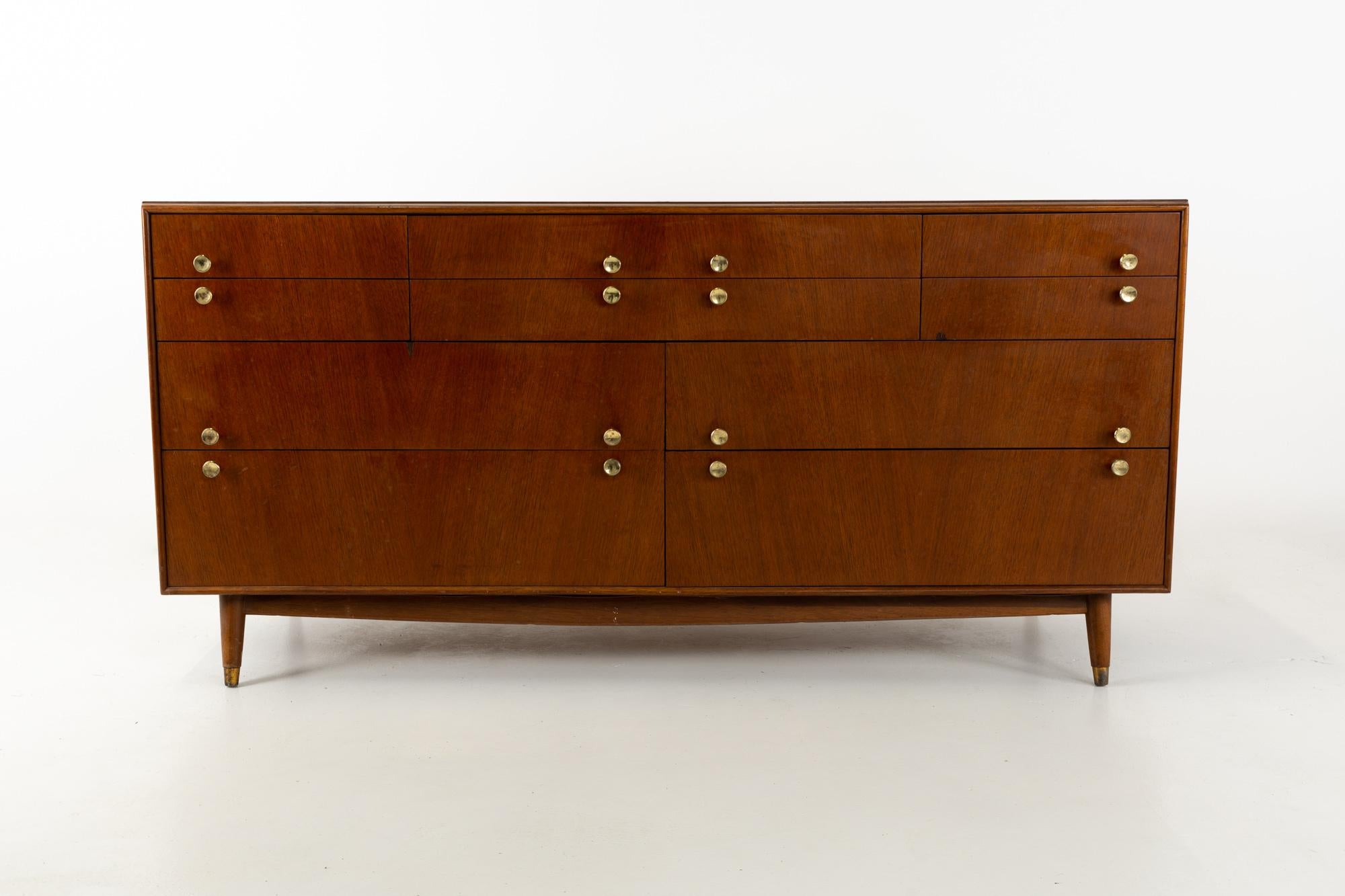Kroehler Signature Series style Mid Century walnut and brass 8-drawer lowboy dresser
This dresser is 64 wide x 20 deep x 31 inches high

This price includes getting this piece in what we call restored vintage condition. That means the piece is