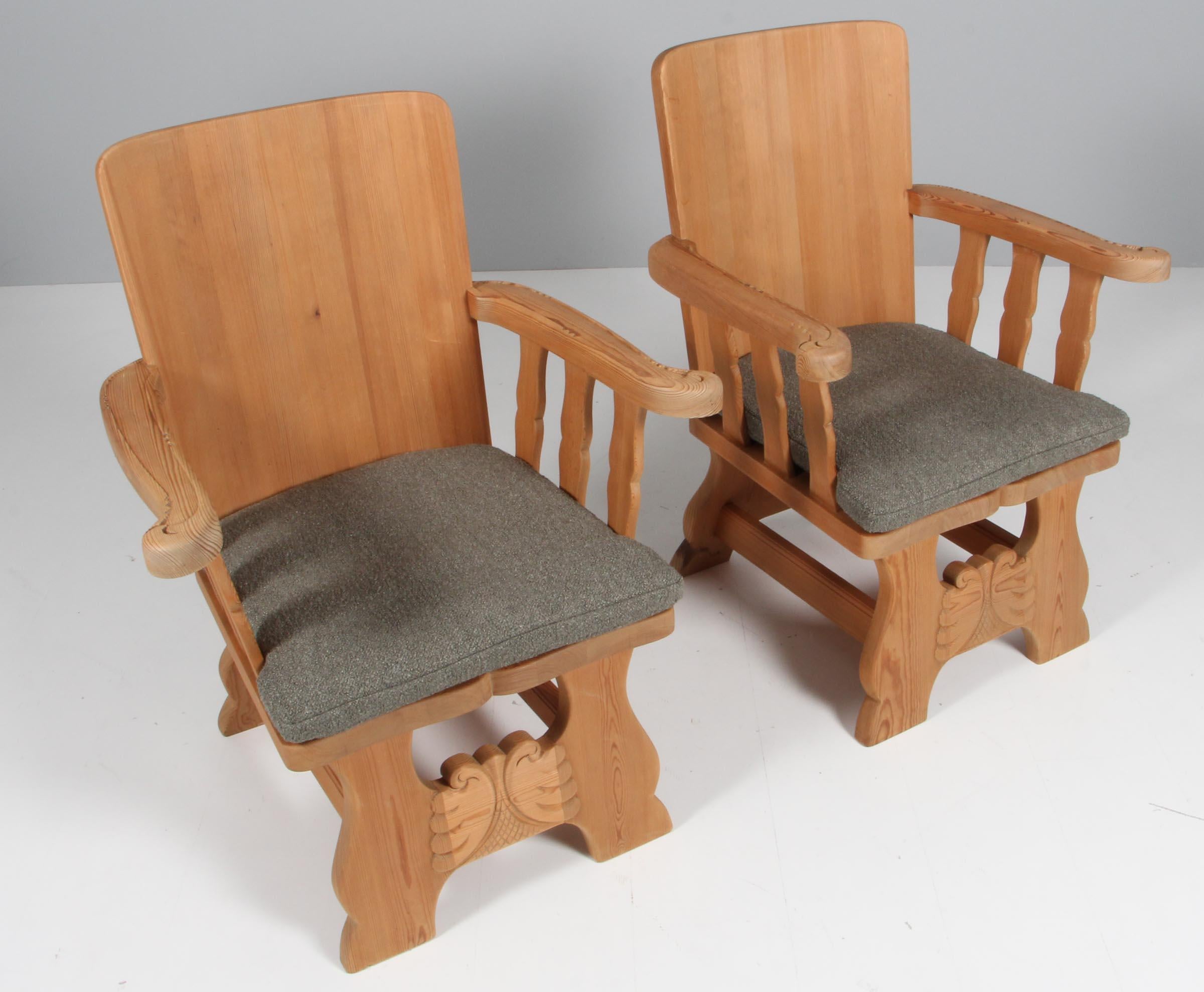 Pair of lounge chairs / armchairs made by Krogenæs in Norway. 

Made of solid pine. New upholstered with boucle fabric.