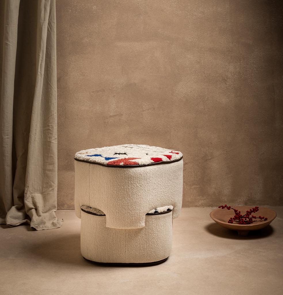 Kros Pouf, which has a modern design created by the combination of geometric forms, was designed as a complementary and eye-catching product in residences and various areas, as a striking piece with its handcrafted weaving.

Upholstered product on