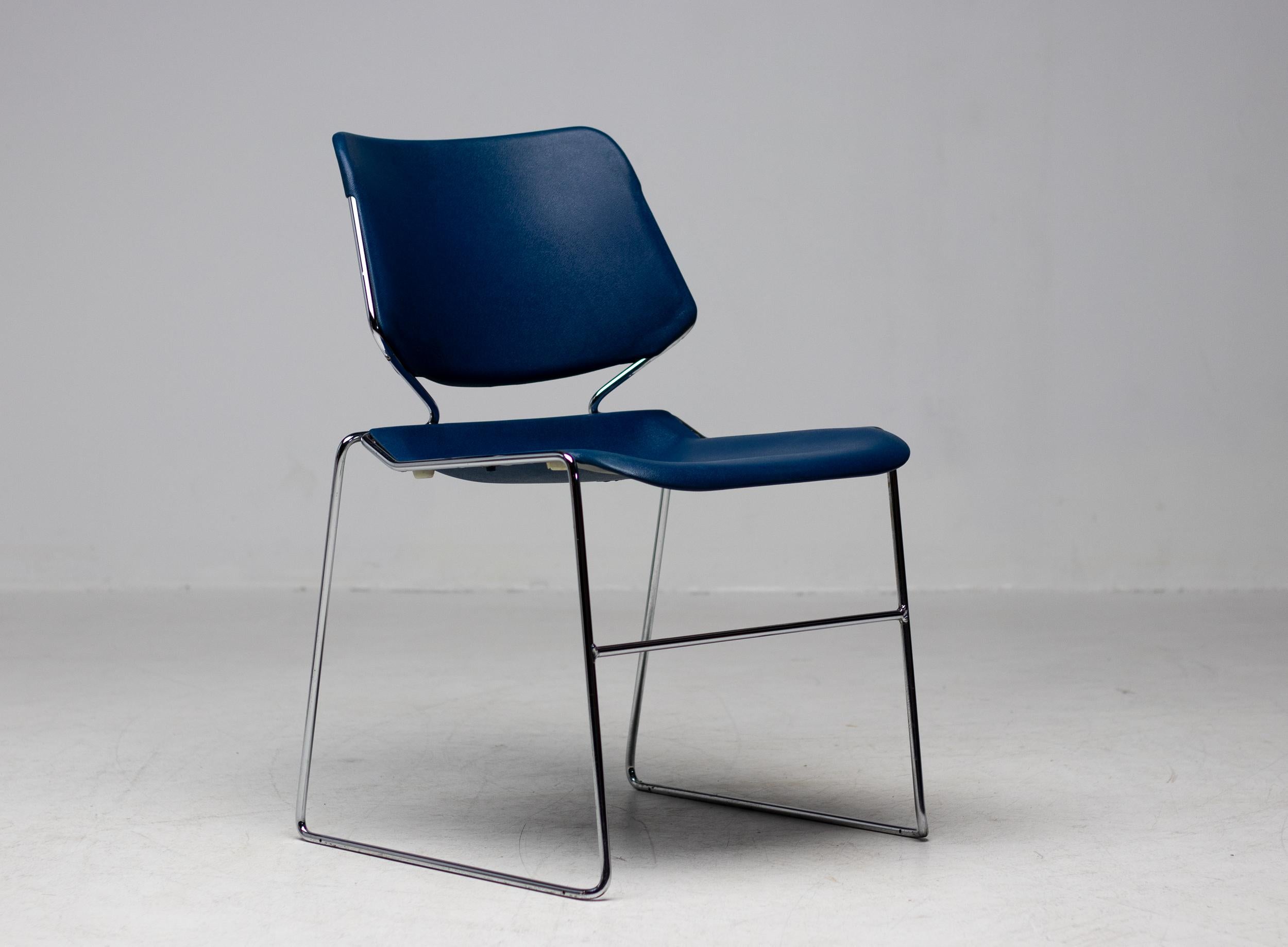 Stackable midcentury modern Krueger Matrix chairs manufactured in the USA in the 1970s. 
Clean and minimalistic design by Thomas Tolleson in beautiful cobalt blue.  
The chairs are very comfortable and the condition overall is very good with the odd