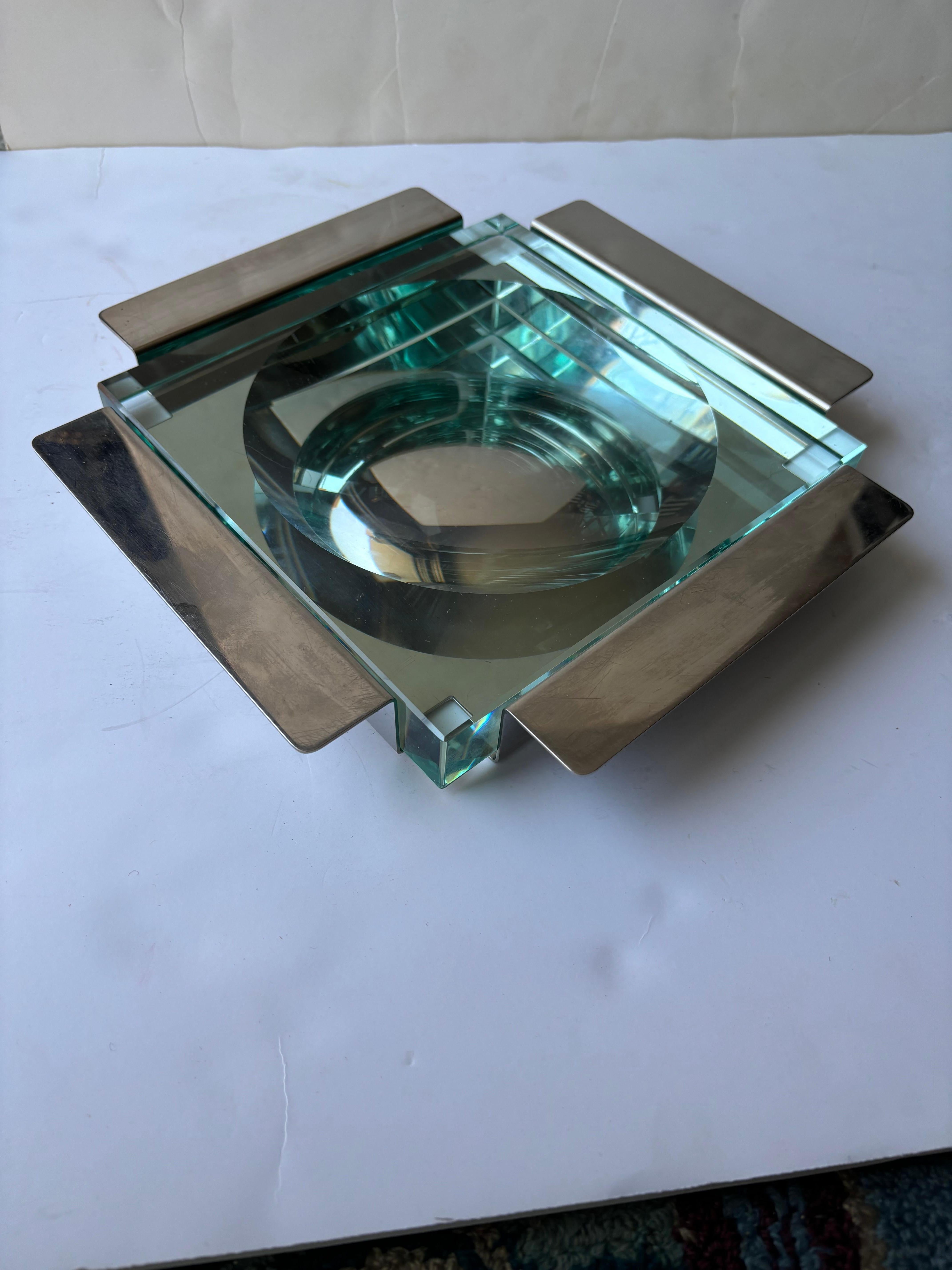 Nice collaboration design in this low bowl / vide -poche for Arthur Krupp and Gillian Gramigna , the crystal insert is attributed to Fontana Arte .No Chips or cracks in glass .
