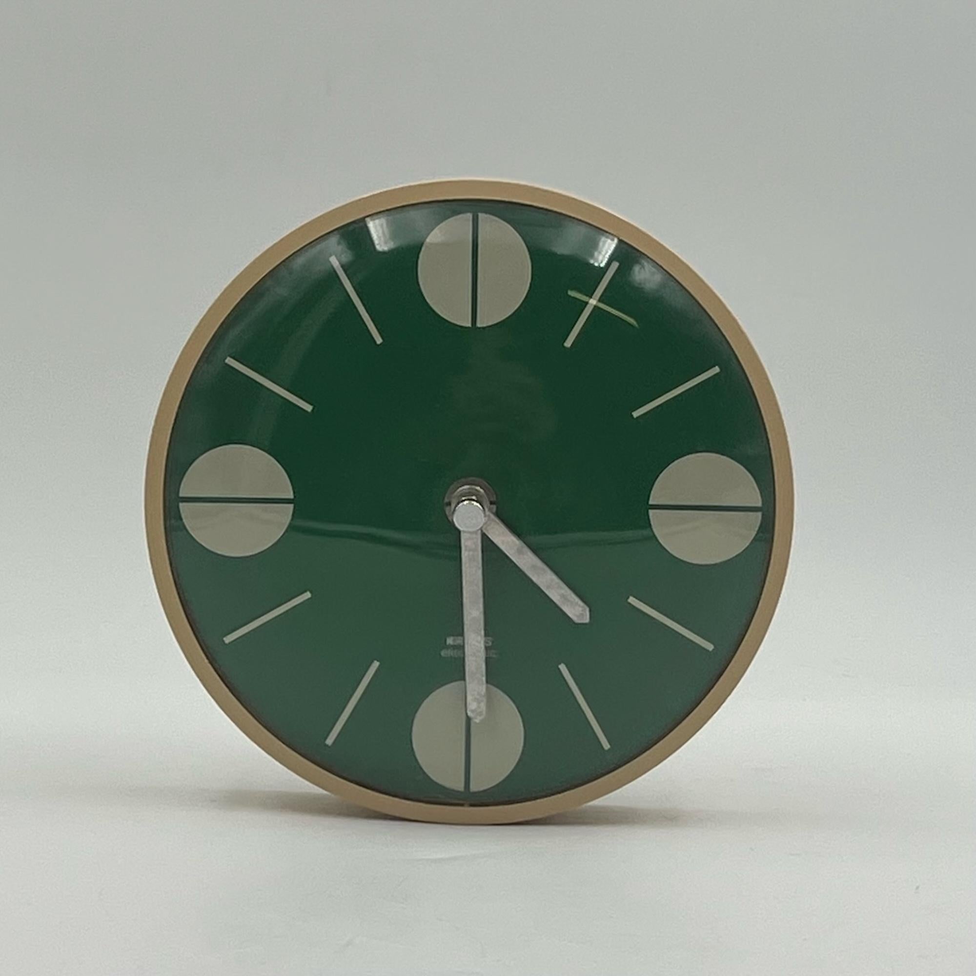 Dive into the retro-futuristic charm of the 1970s with this stunning space age wall clock by Krups Germany. Renowned for their quality craftsmanship, Krups presents a rare gem from the era, featuring a striking green hue that sets it apart from the