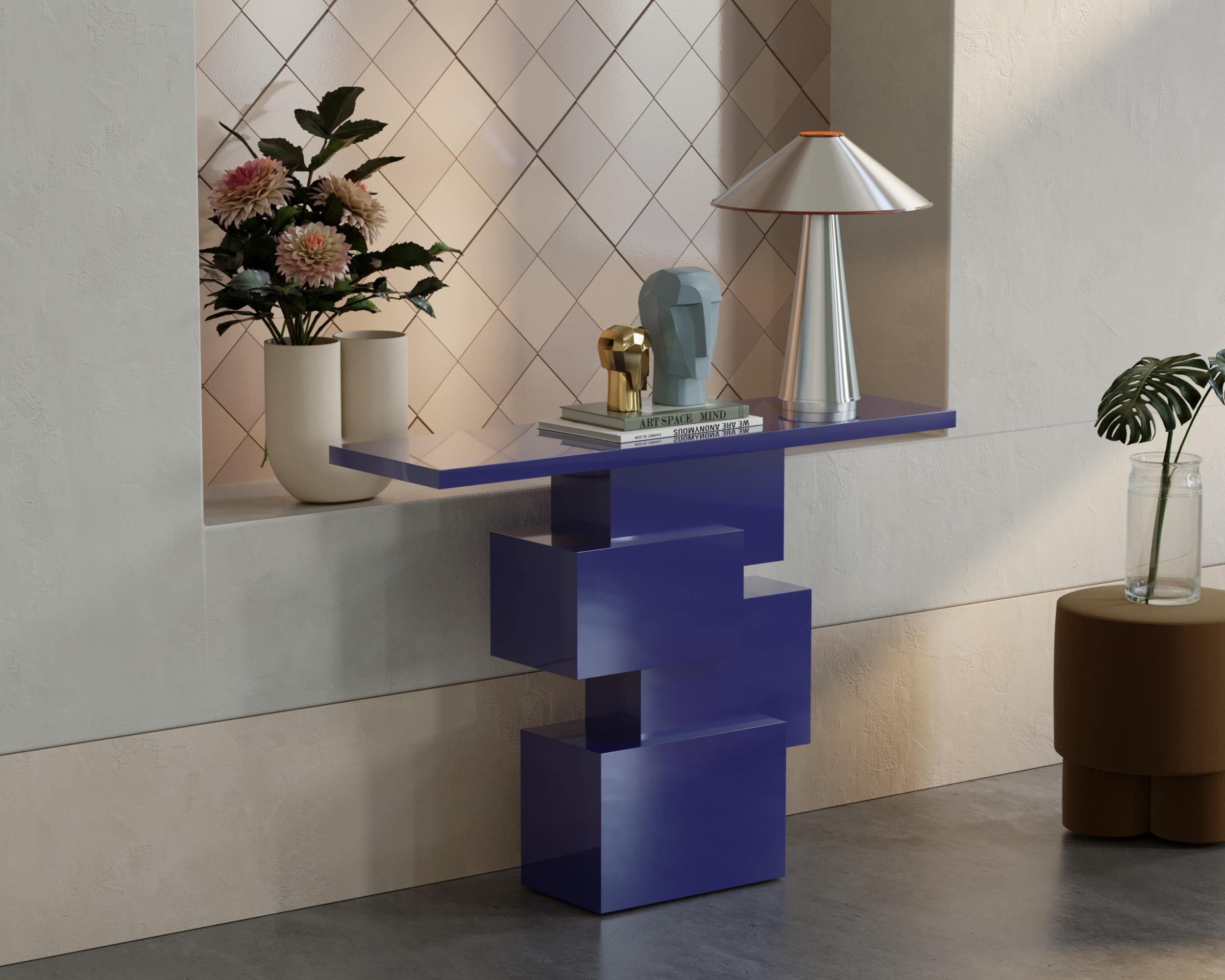 The Kruz console table embodies a bold brutalist aesthetic, characterized by its pure cubic forms and sculptural presence. Designed by Hermhaus, this striking piece commands attention, making a strong statement in any space. Whether placed in an