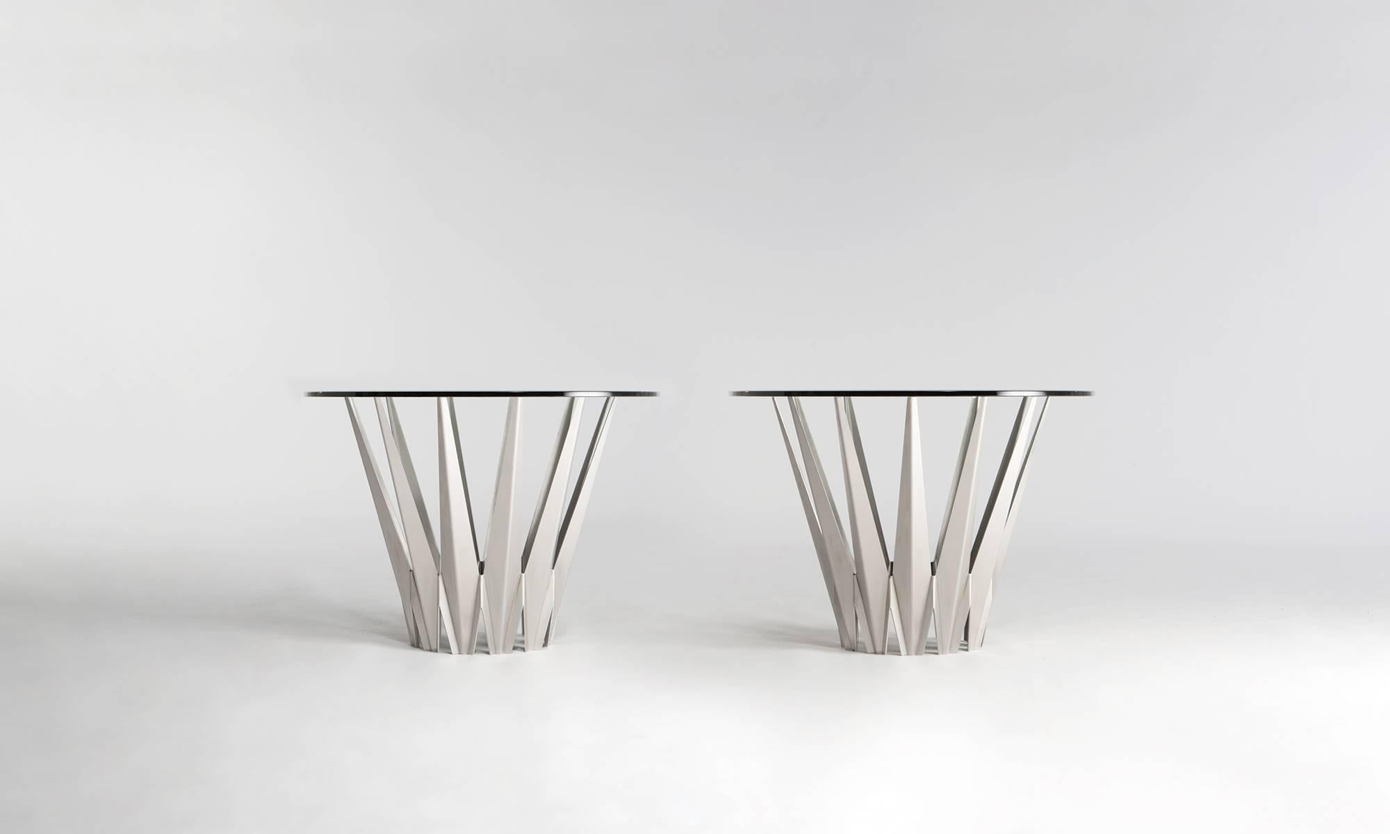 Krystalline Brushed Stainless Steel Side Table. Krystalline is a Made to Order product line available in the brushed stainless steel as well as powder coated colors. The table form can be modified upon request to meet client specifications.