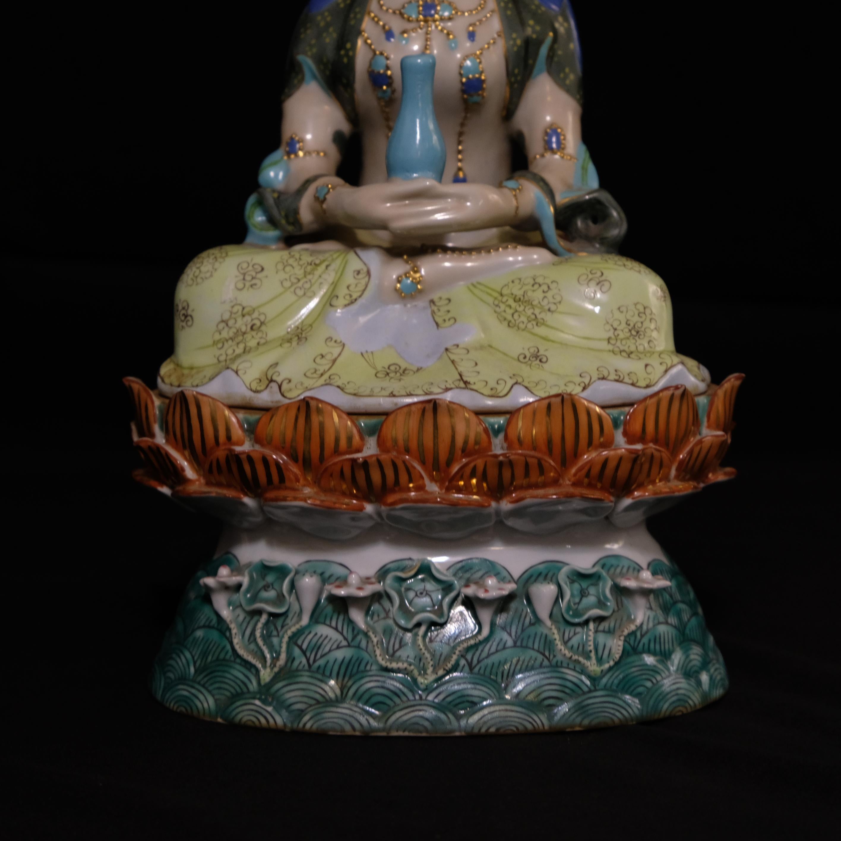 Chinese Kuan Yin Seated on a Lotus Base, Porcelain Figure of Mid 20th Century For Sale
