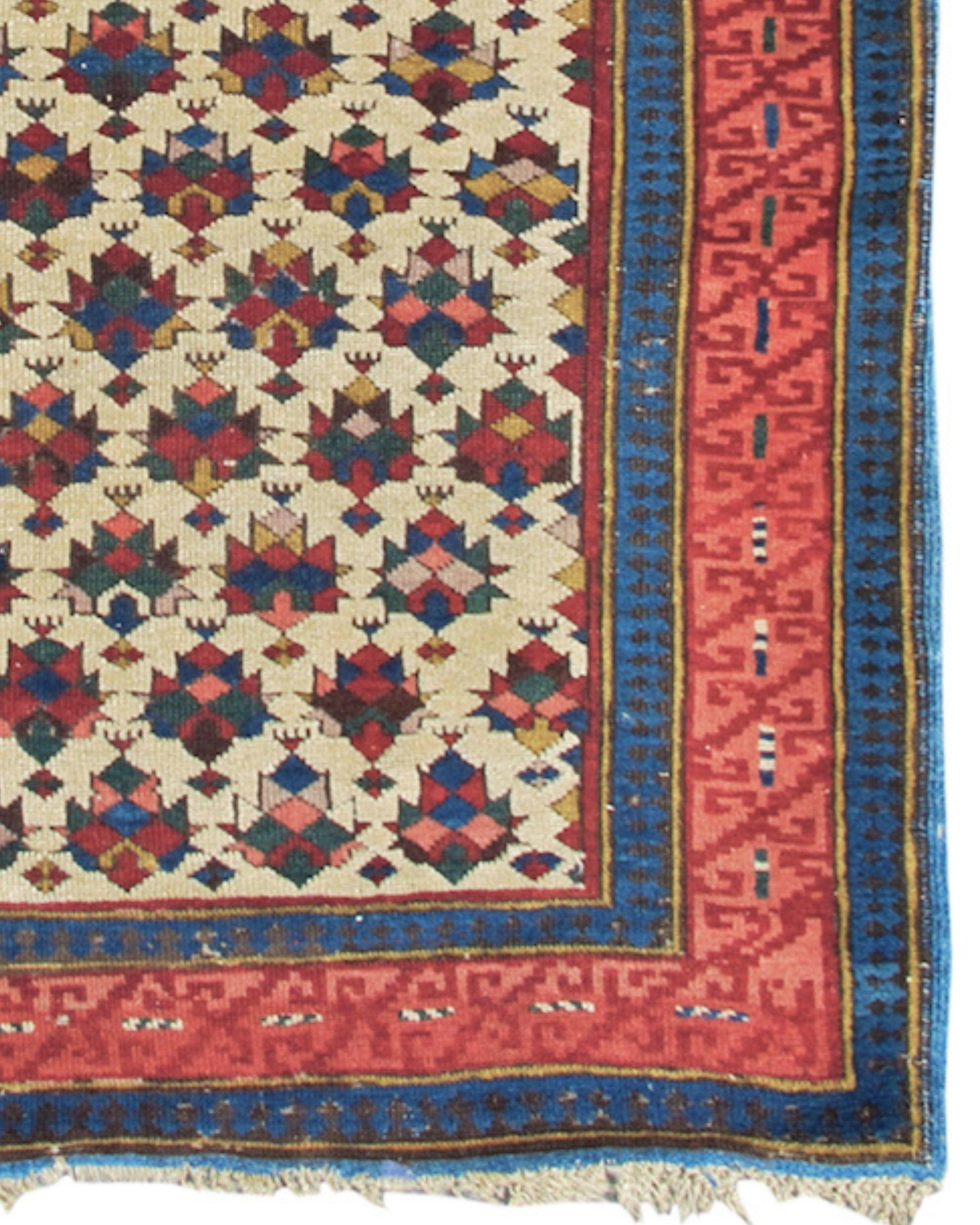 Kuba Rug, 3rd Quarter 19th Century

Stylized almost crystalline shrubs painted in a rainbow of colors are drawn against the crisp ivory background of this Kuba rug from the Southeast Caucasus. Each motif is individuated with few if any sharing the
