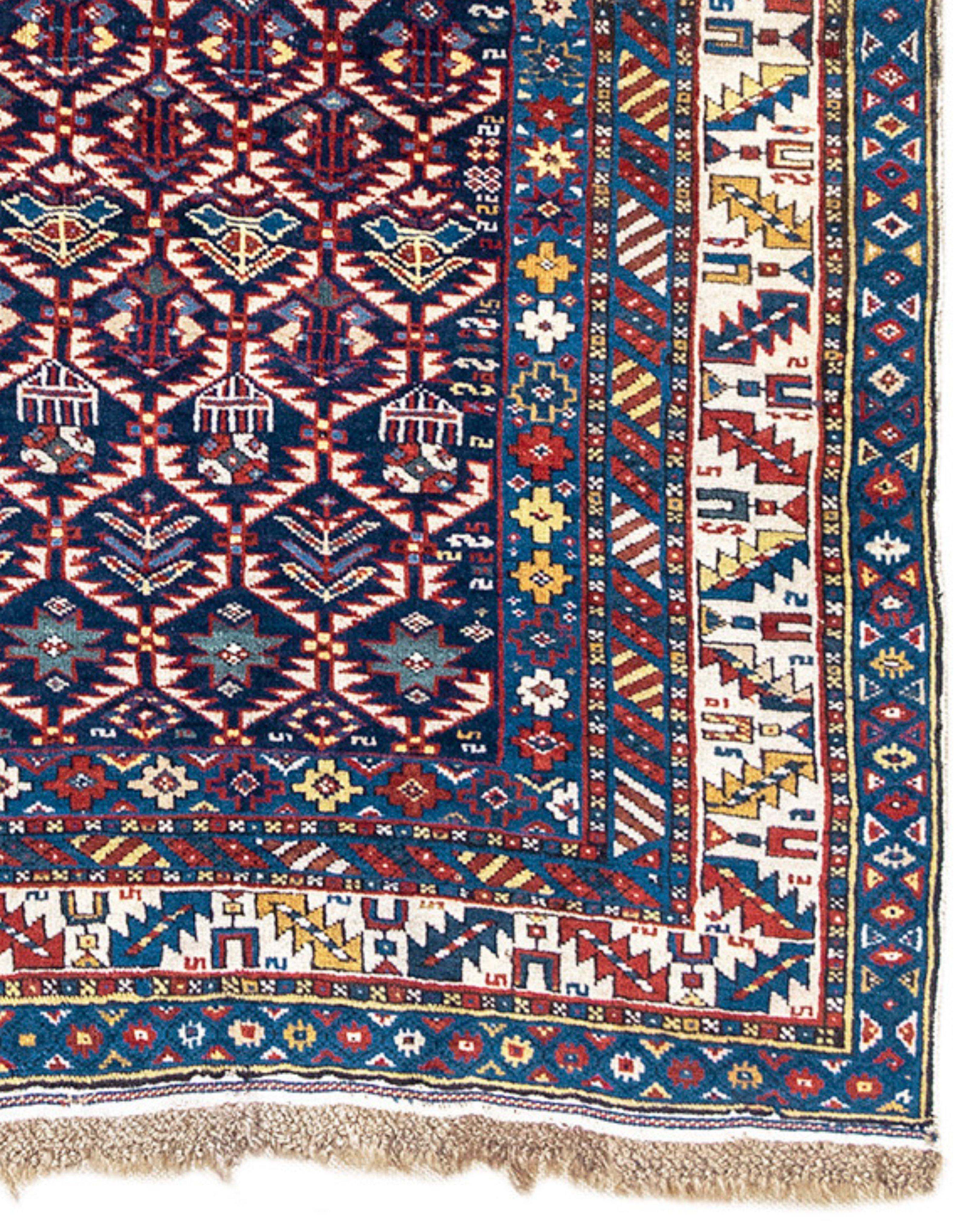 Kuba Rug, 19th Century

This jewel of an East Caucasian rug draws a host of folk motifs within a lattice of abstracted ivory foliage. Rows of colorful shrubs, flowering plants, eight-pointed stars, and even human figures atop horses glow against a