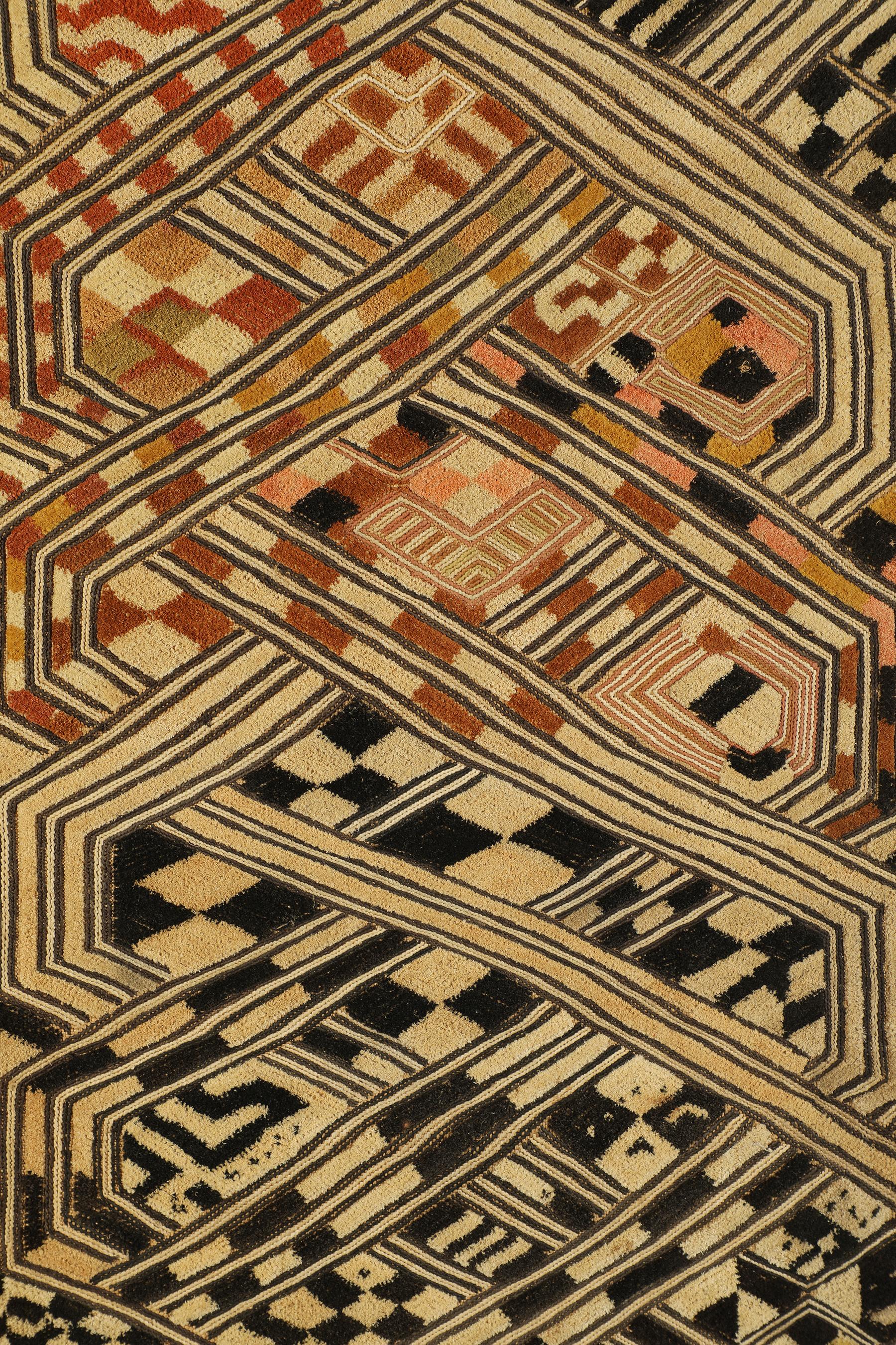 Shoowa Prestige Cloth 
Kuba Shoowa peoples
DR Congo, Kasai Region
Raffia palm fiber, natural and chemical dyes, cut-pile and stem stitch embroidery
24.5 x 24.5 inches  (62 x 62 cm)

An exciting and multicolor version of the Kuba 