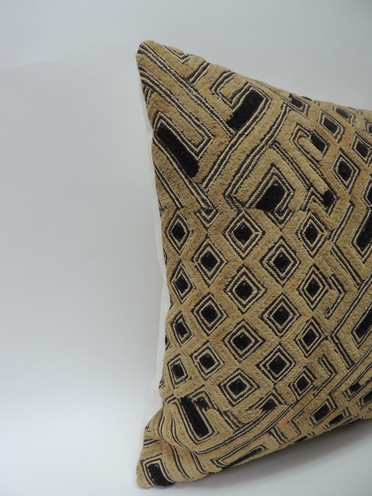 Antique raffia velvet tribal cut-pile square design hand woven pillow. Intricate tribal patterns in shades of tan, black and brown with natural linen backings. Decorative pillow designed and handcrafted in the USA. Hand-stitched closure (no zipper.)