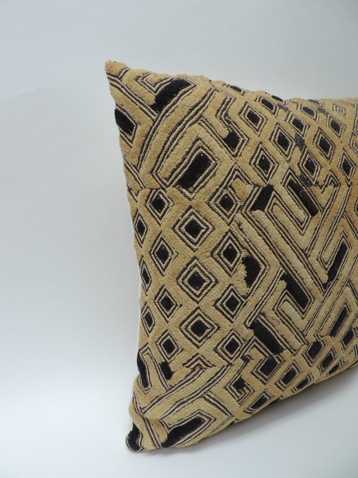 Antique raffia velvet tribal cut-pile square design handwoven pillow. Intricate tribal patterns in shades of tan, black and brown with natural linen backings. Decorative pillow designed and handcrafted in the USA. handstitched closure (no zipper.)