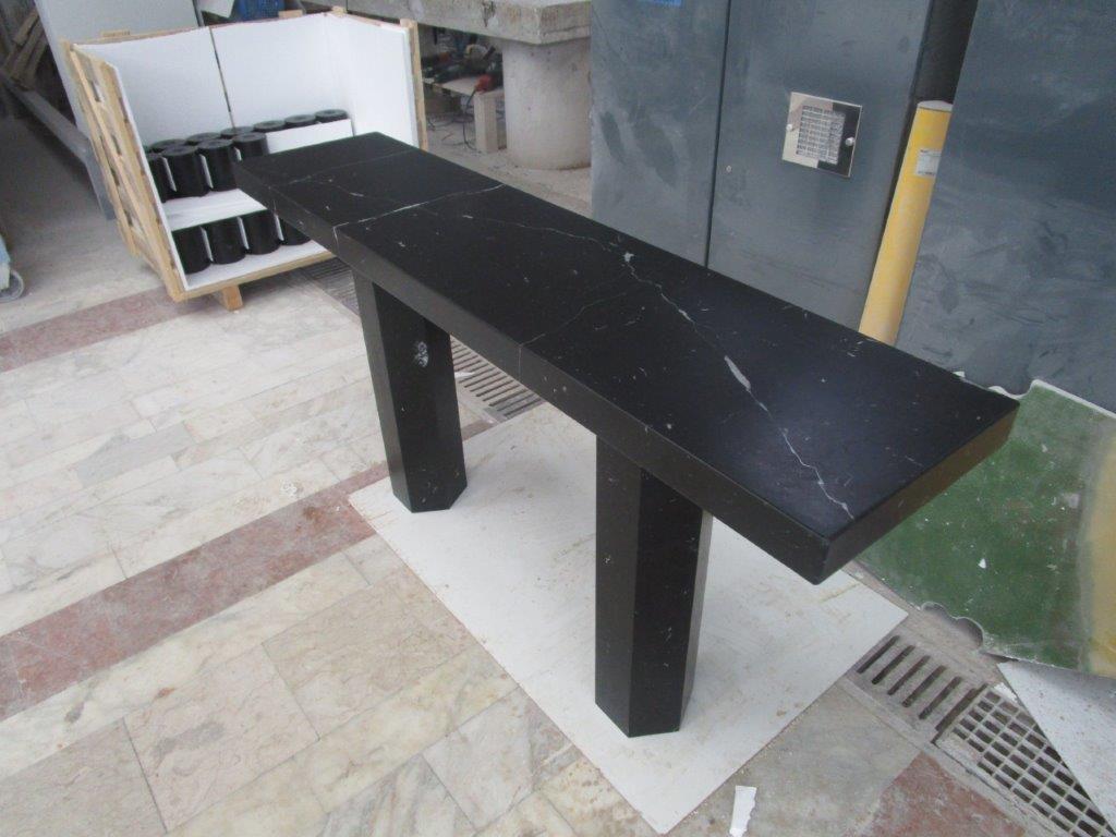 Kubo table in Nero Marquina honed stone. Perfect for any home. Please inquire for information about other marble material choices.