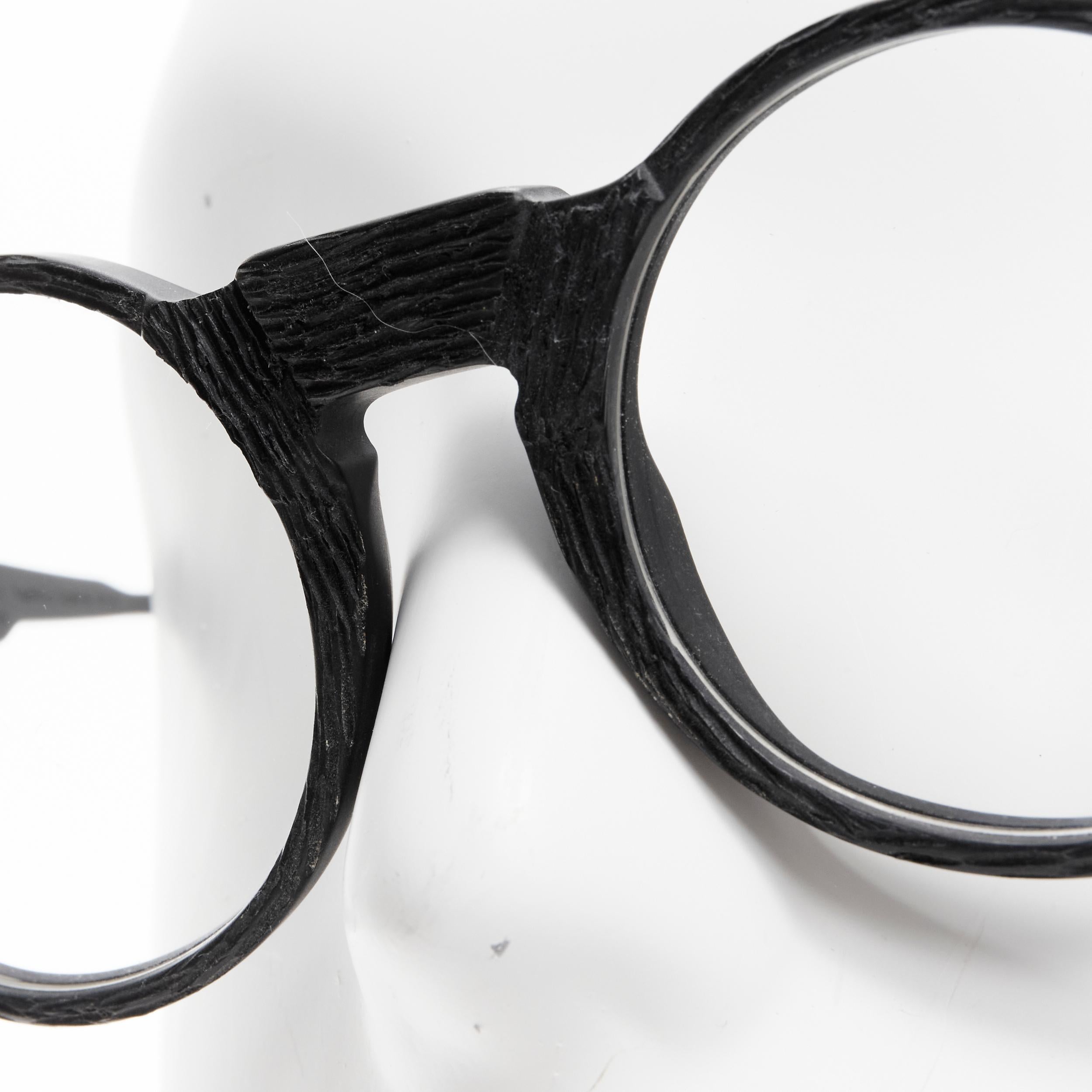 Gray KUBORAUM Mask K10 matte black wood textured round frame clear lens