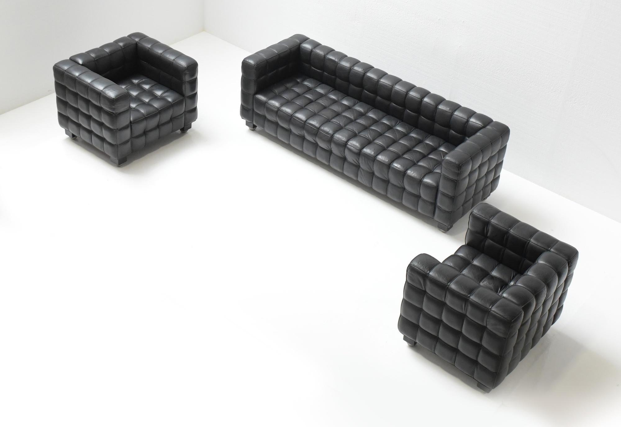 Stunning & rare matching Kubus set. Still 100% original and with manufacturer plaque on the bottom of each chair.
Designed by Josef Hoffmann & produced by Witmann.
A Classic example of Hoffmann’s strict geometrical lines.

The Kubus sofa was