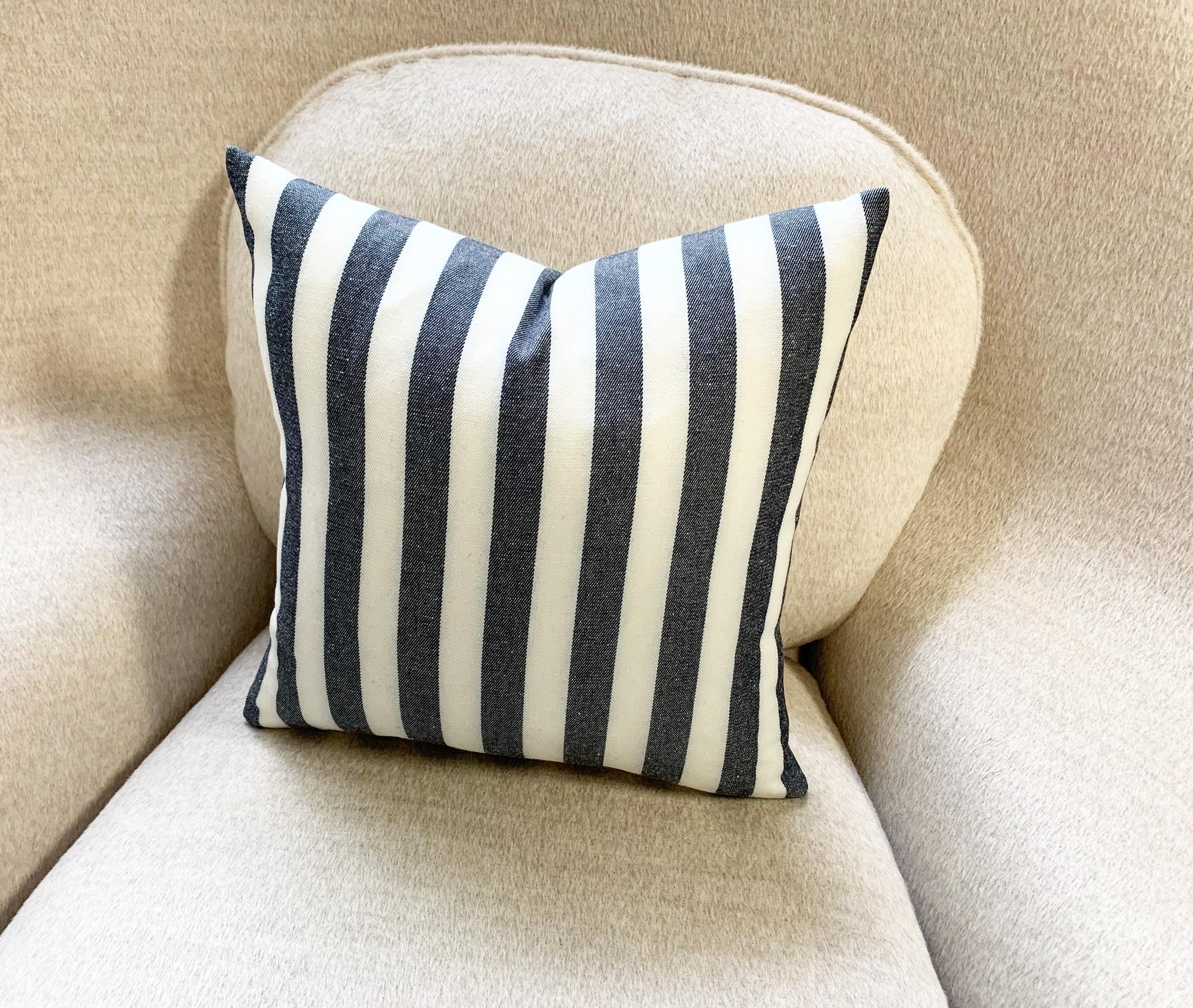 Kule's incredibly chic stripe fabric was used to make this beautiful pillow crafted in our Saint Louis studio. Down feather insert included. Measures: 14