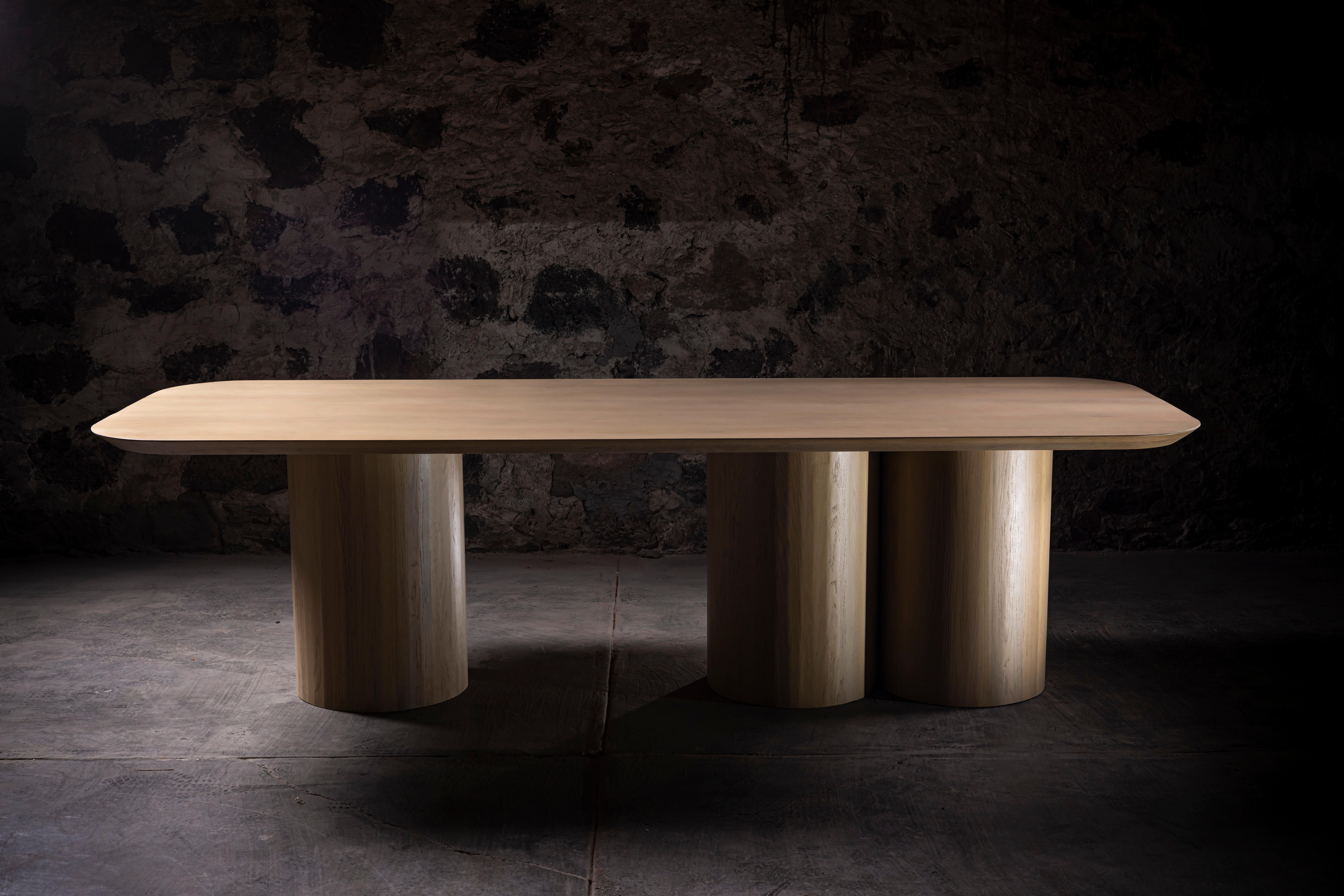 Kulindros Rectangular Dining Table in Solid Oak by No Age Studio
Dimensions: D 114.3 x W 215.9 x H 76.2 cm. 
Materials: Oak.
No Age Studio - Handcrafted Furniture

Every piece we create is made to order, crafted with care and precision to meet your