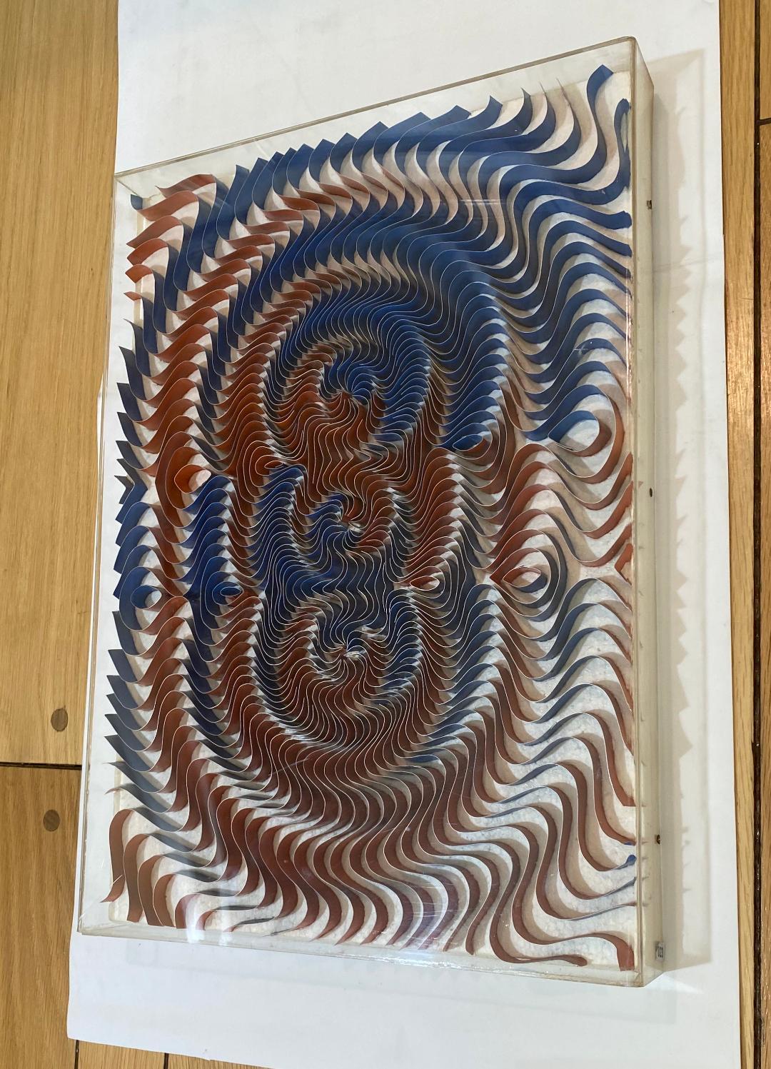 Nice wall, painting/sculpture for the Japanese avant-garde artist Kumiko Imanaka. The work has not been examined out of acrylic box, seems is stainless steel waves and paint.