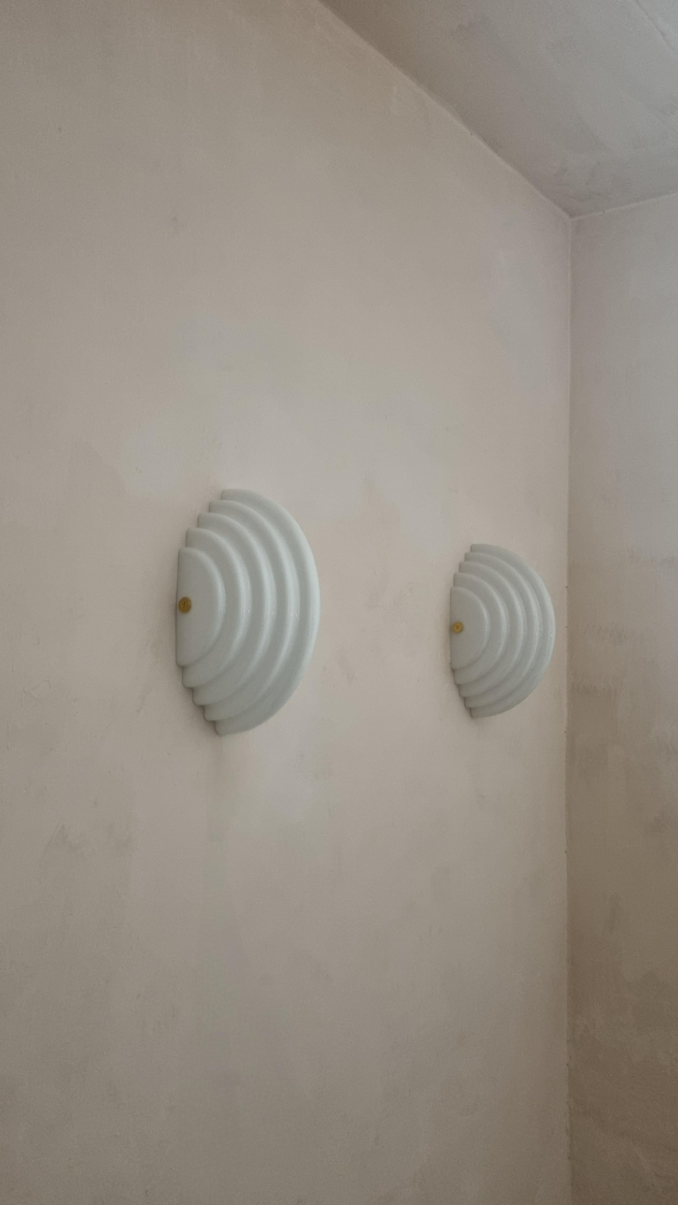 Kumo 2 Wall sconces designed by  Kazuhide Takahama for Sirrah, Italy 1983.
Acrylic structure, metal.
Excellent condition.

Kazuhide Takahama (1930 - 2010) was born on the Japanese island of Kyushu. In 1953 he graduated from the Tokyo Institute of