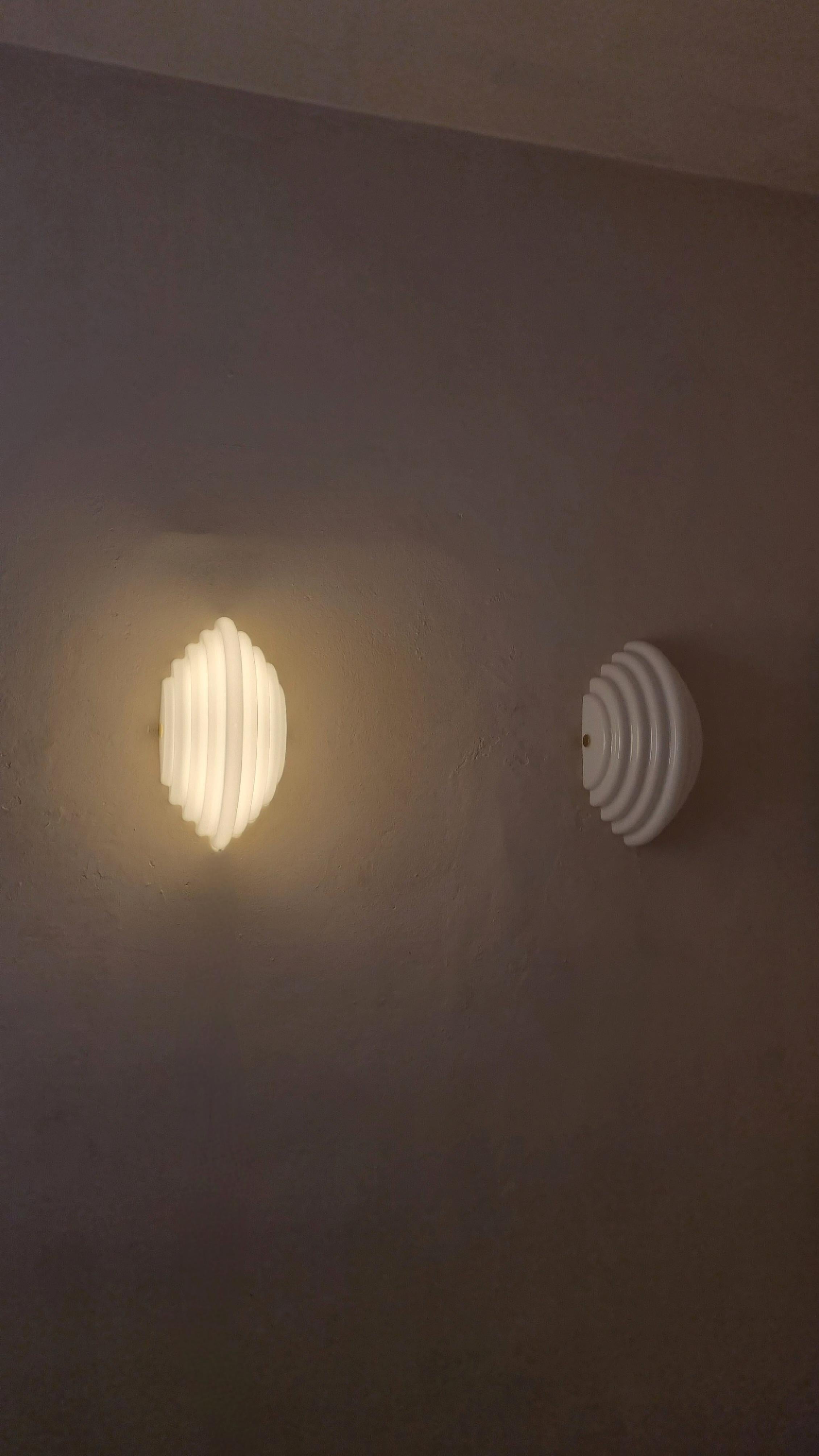 Mid-Century Modern Kumo 2 wall sconces designed by Kazuhide Takahama for Sirrah 1983