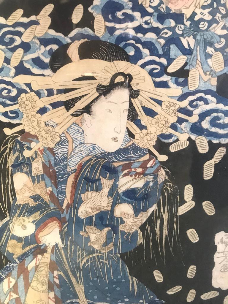 This is a gorgeous print of robed Geisha, intricately designed and beautifully colored by master Edo period Japanese printer Kuniyoshi Utagawa. A rare image.

This would be a fantastic addition to any Japanese print collection or a great stand