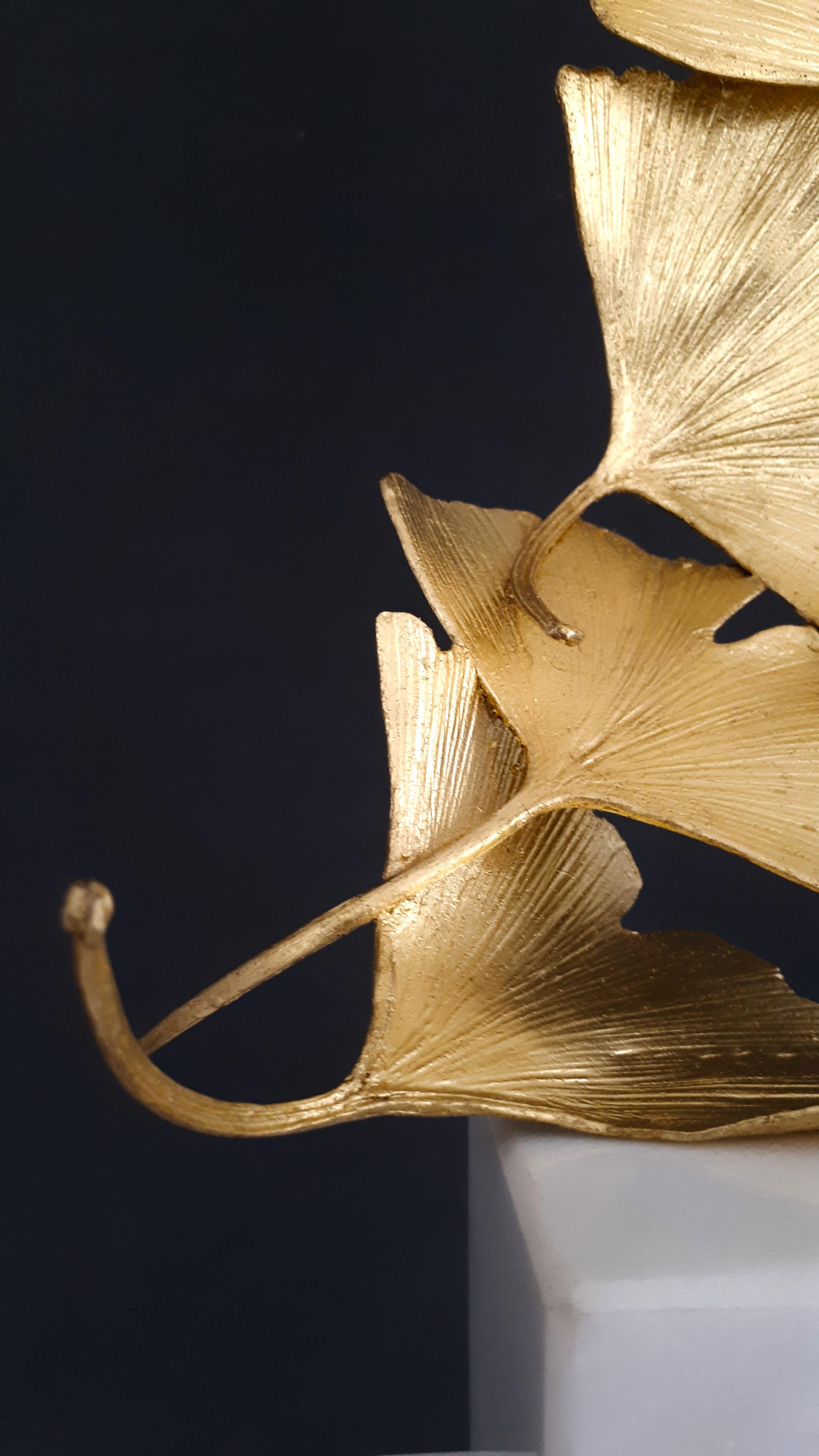 Artist: Kuno Vollet

Title: Golden Gingko with 6 leaves art sculpture

Materials: Cast brass, gold leaf, white marble base

Size: 56 x 9 x 9 cm

_______________________________________________________________________

This elegant original bronze