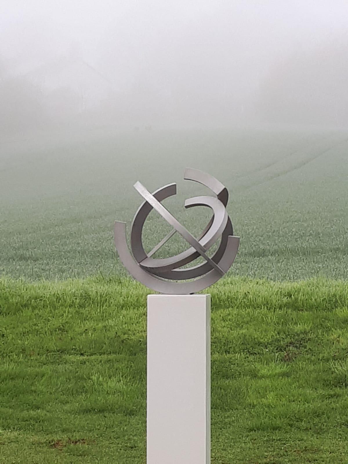 Beautiful steel sculpture for indoor or outdoor use. This stunning satin stainless steel contemporary sculpture is a timeless and elegant piece. Circular lines are shaping the matte metal into an abstract artwork like no other.

About the