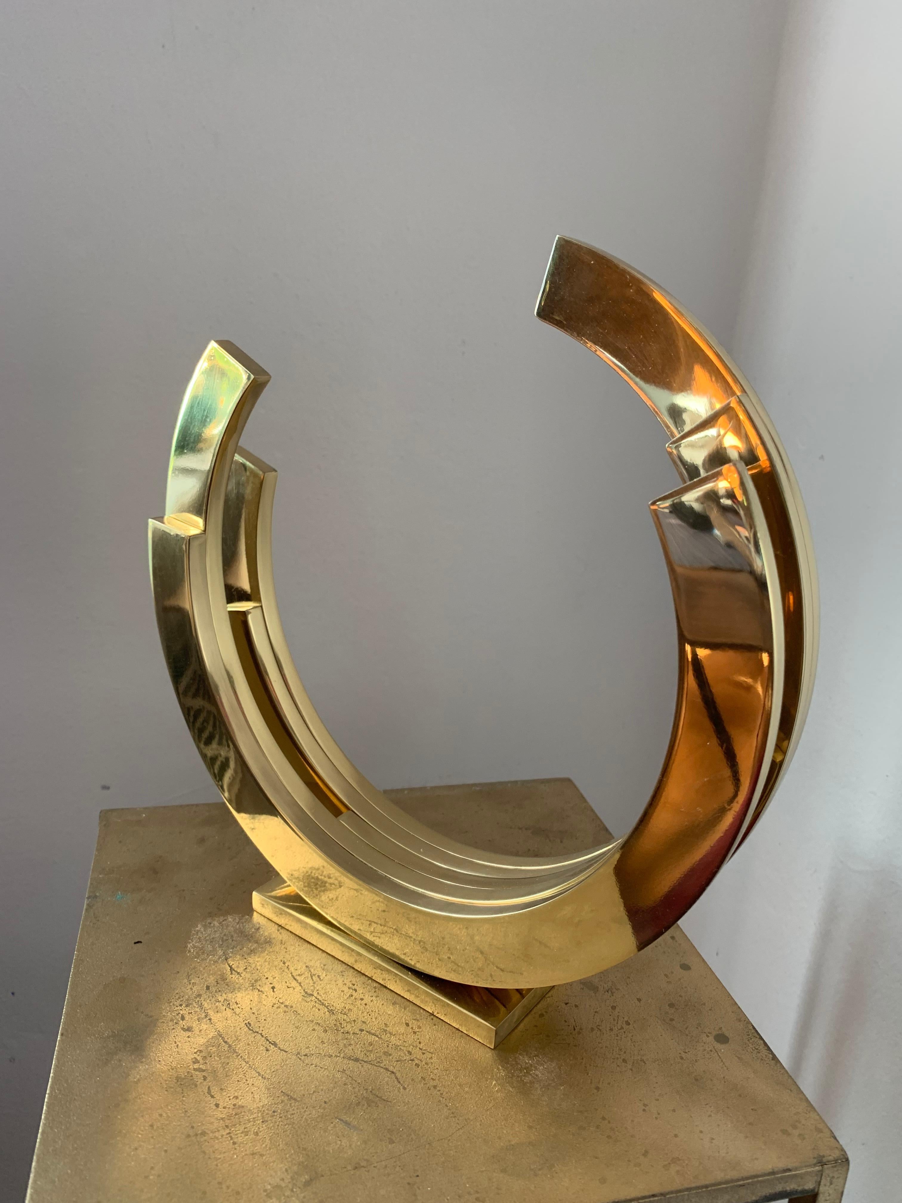 Contemporary Minimal Gold Brass sculpture, gilded and then lacquered to keep its shiny surface.
Limited edition of 10
Kuno Vollet is a sculptor working with different materials such as clay, bronze and brass. 
Other works are not cast but heated and