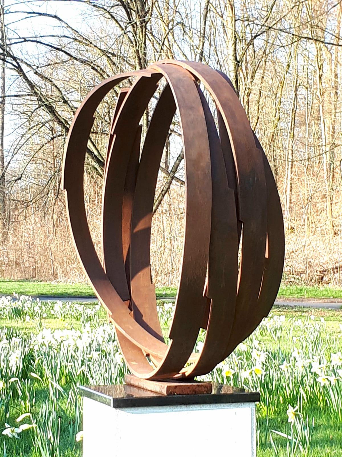 Artist: Kuno Vollet

Title: Orbit

Contemporary rusted steel sculpture for inside or garden outdoor spaces.

Beautiful circle - sign for infinity. Stunning large artwork. Possible to put on a pedestal or directly on to the ground.
This artwork takes