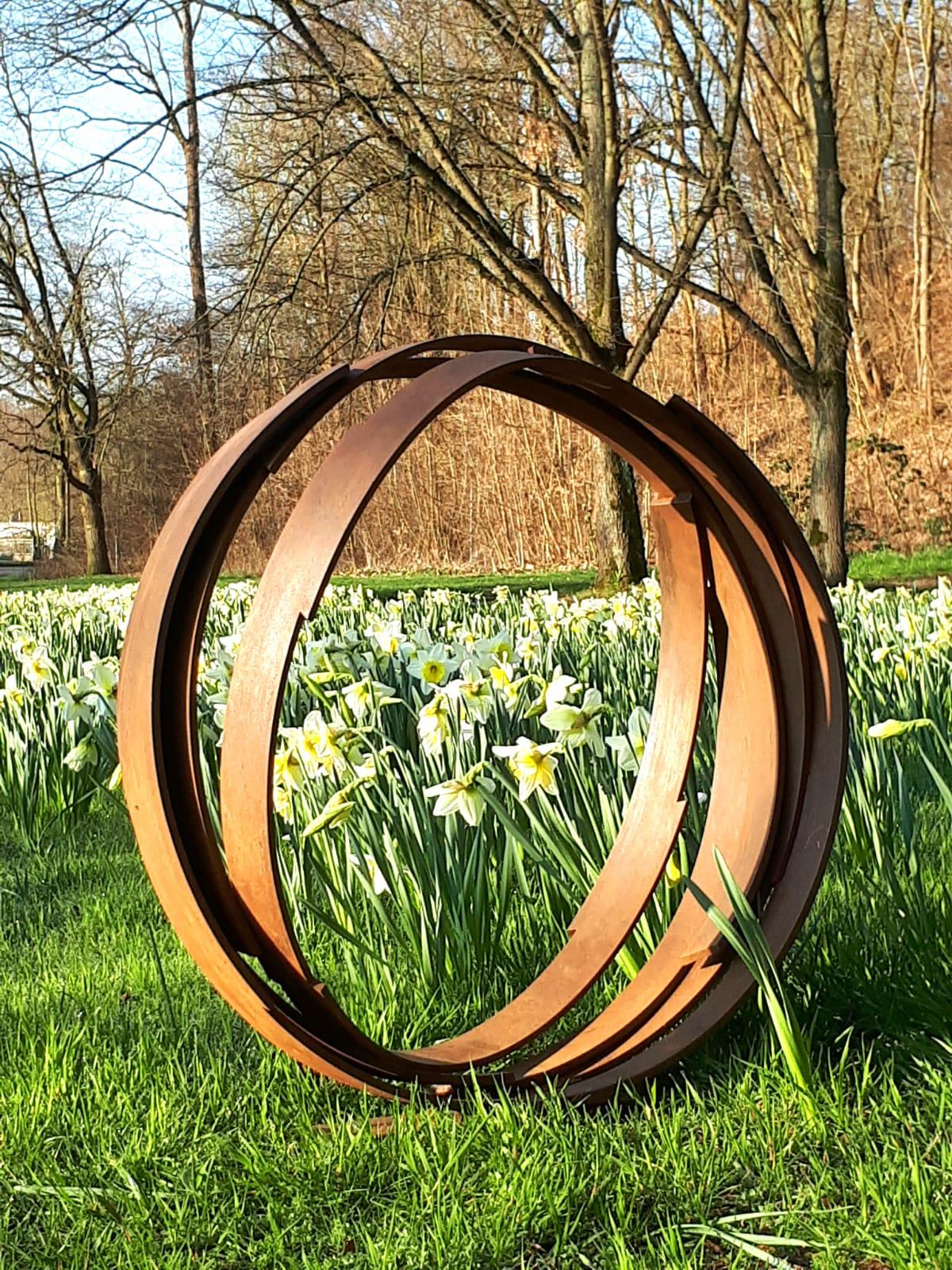 Artist: Kuno Vollet

Title: Orbit

Contemporary rusted steel sculpture for inside or garden outdoor spaces.

Beautiful circle - sign for infinity. Stunning large artwork. Possible to put on a pedestal or directly on to the ground.
This artwork takes