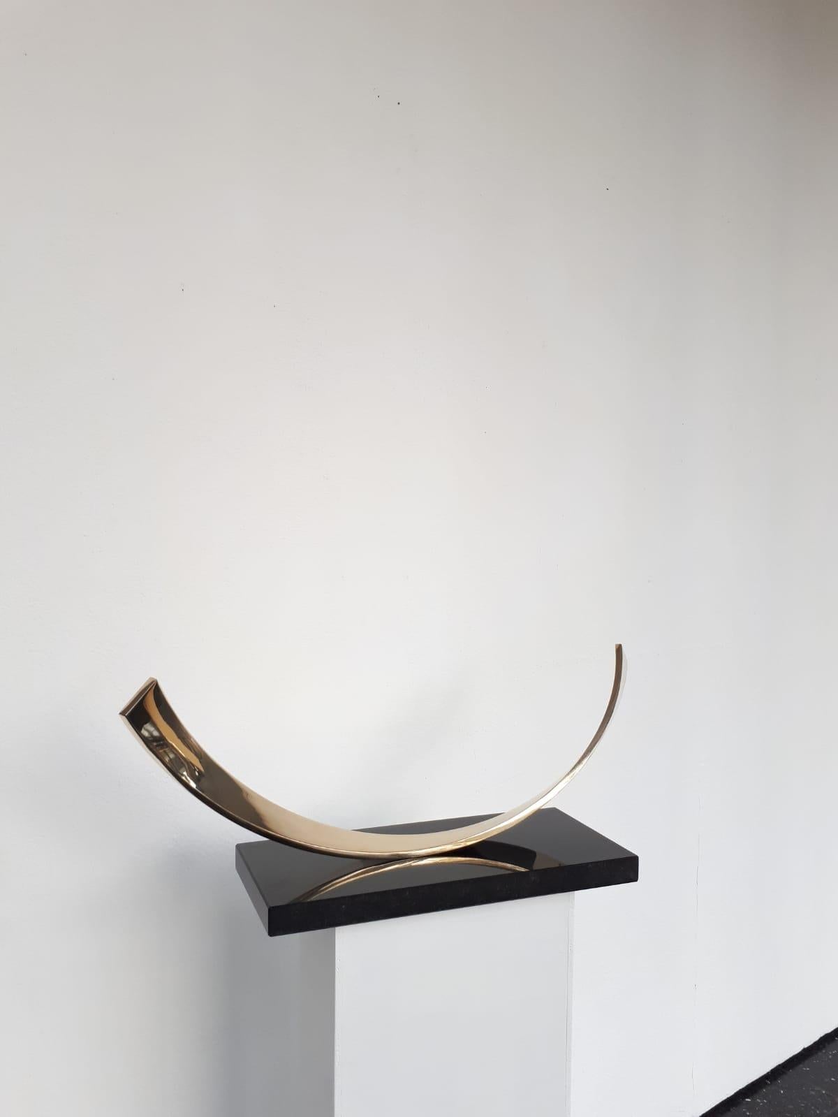 Artist: Kuno Vollet

Title: Moving Balance

Materials: Polished Bronze on black granite base

This sculpture moves back and forth like a swing once activated it moves for around 5 minutes. Please get in touch for a short movie to see the effortless