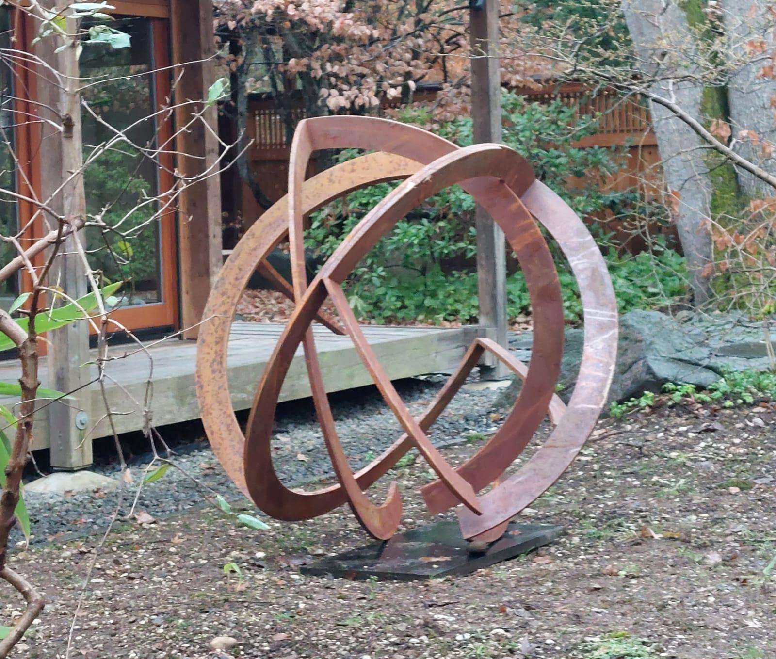 Artist: Kuno Vollet

Title: Orbit

Contemporary rusted steel sculpture for inside or garden outdoor spaces.

Beautiful circle - sign for infinity. Stunning large artwork. Possible to put on a pedestal or directly on to the ground.
This artwork takes