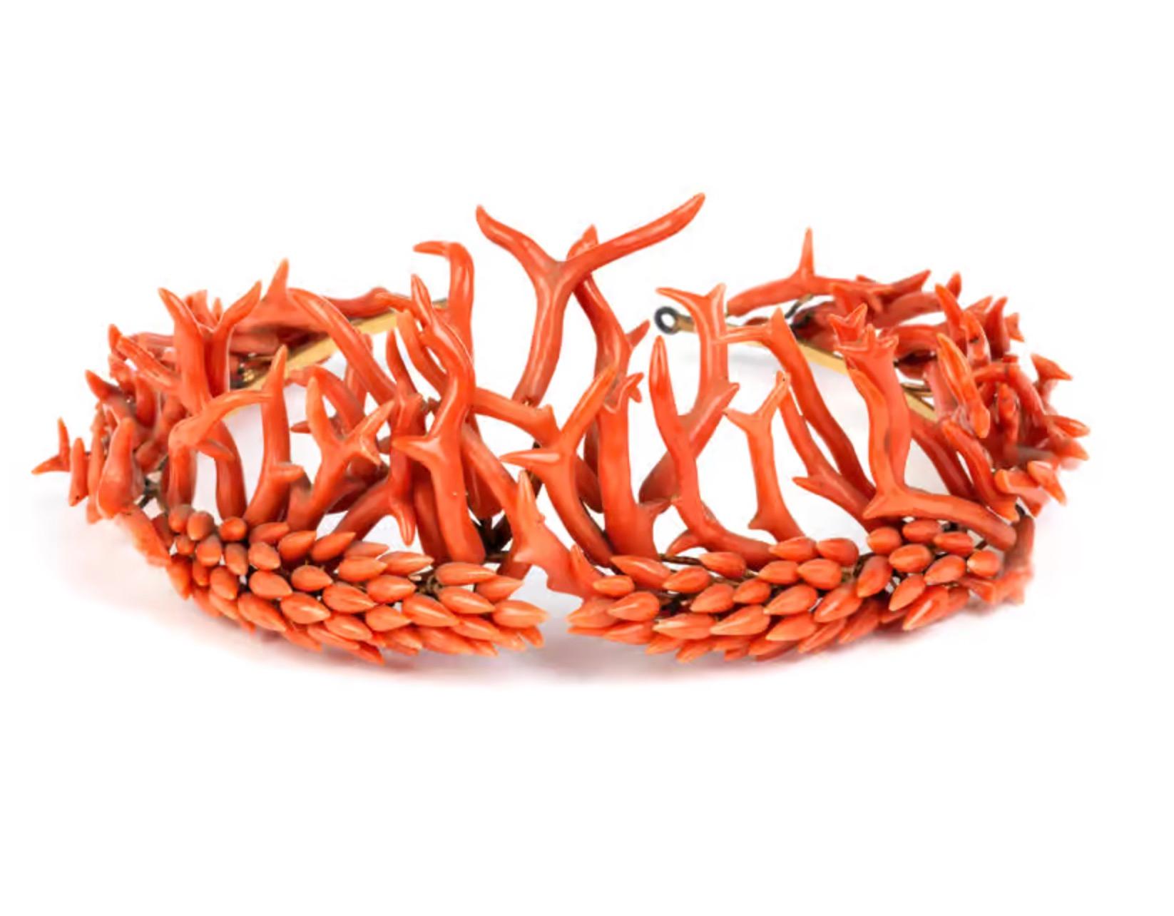 A highly refined and rare precious red coral crown or tiara by the Phillips Brothers, London
Robert Phillips, circa 1850, unmarked

Measures: Height. 6 cm (front)
Diameter. approx. 15 cm


On a finely made powder-coated stand, Worked in the