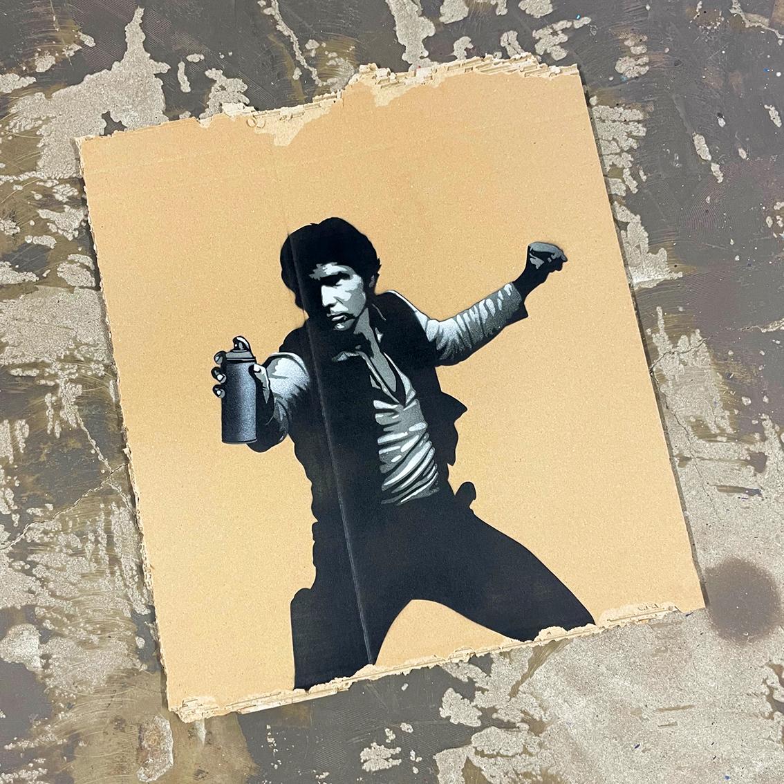 Se trata de una obra de arte original 1/1 pintada con spray sobre cartón en un marco de madera personalizado de la exposición del artista 