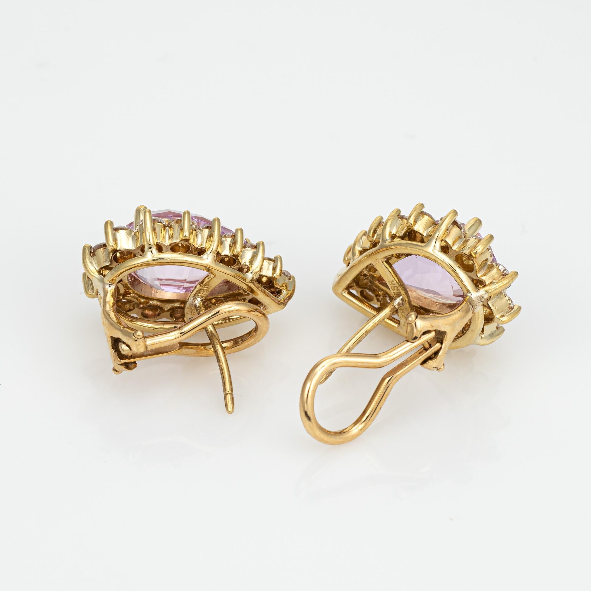 Elegant pair of vintage kunzite & diamond earrings crafted in 18k yellow gold (circa 1980s). 

Faceted pear shaped kunzite is estimated at 3.50 carats each (7 carats total estimated weight). 22 diamonds range in size from 0.03 to 0.08 carats and