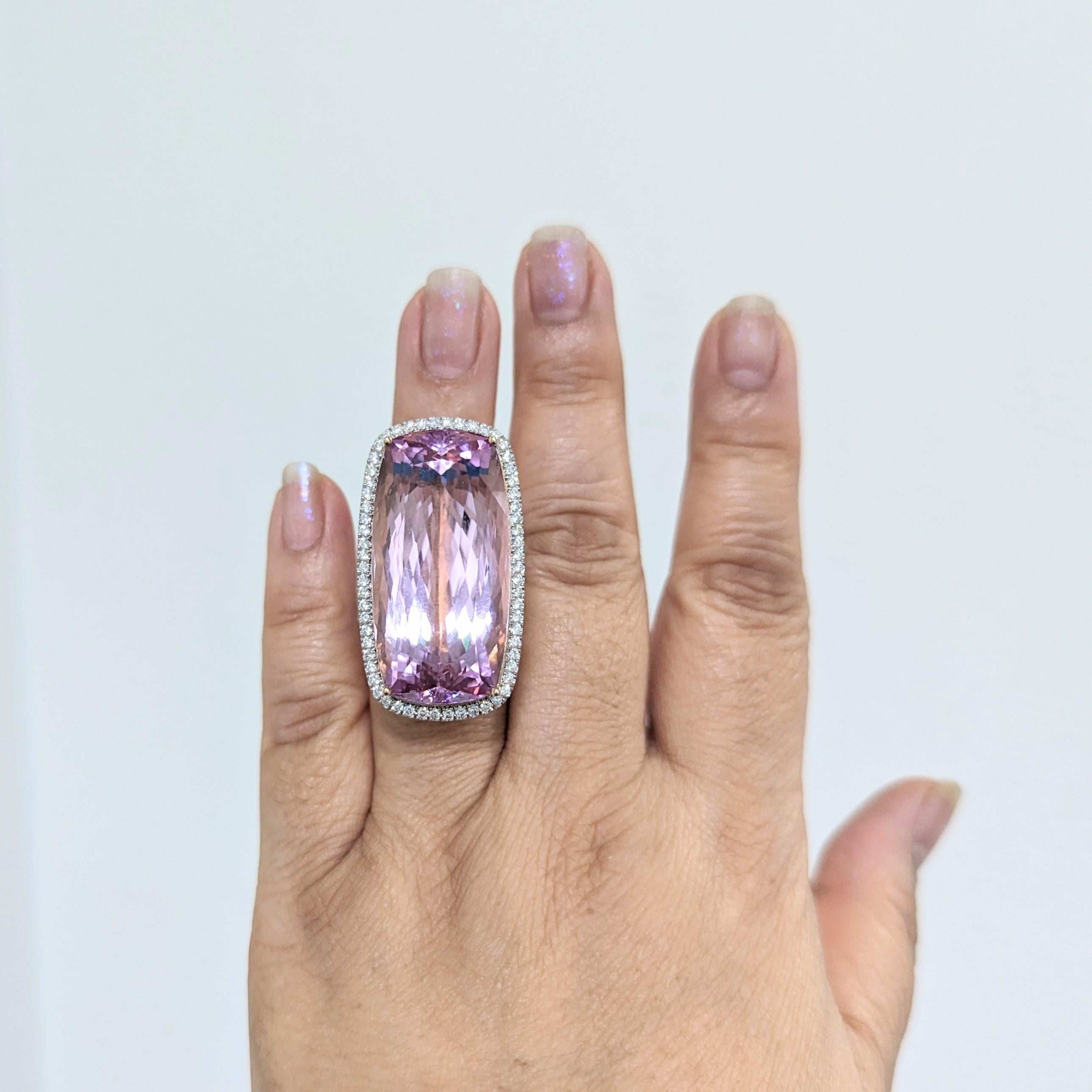 Gorgeous 83.24 ct. kunzite rectangular cushion with 1.45 ct. good quality white diamond rounds.  Handmade in 18k white and yellow gold.  Ring size 6.5.