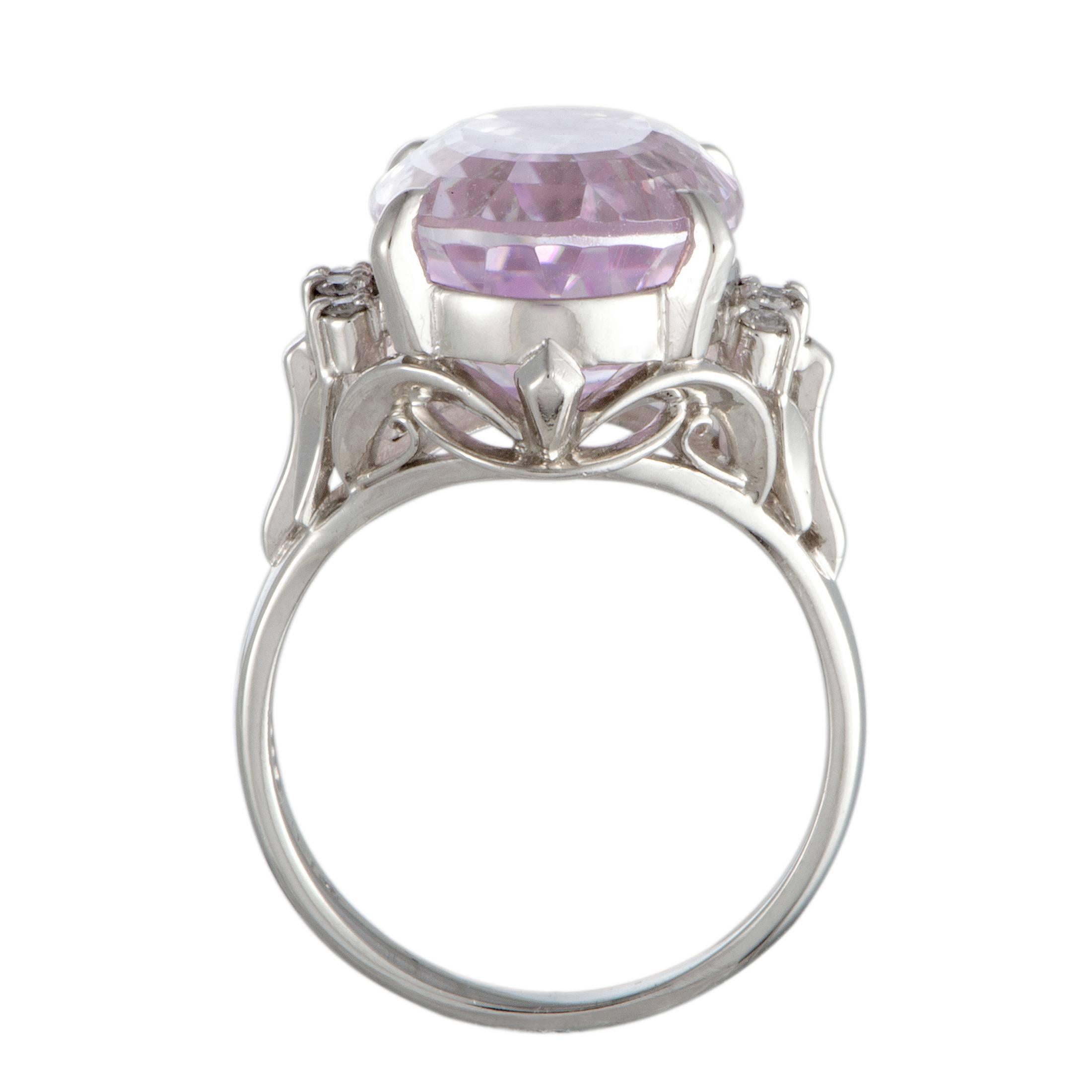 The sublime appeal of kunzite is splendidly complemented in this gorgeous ring by the elegant sheen of platinum and the scintillating brilliance of diamonds. The kunzite weighs 12.97 carats, while the diamonds total 0.07 carats.
Ring Top Dimensions: