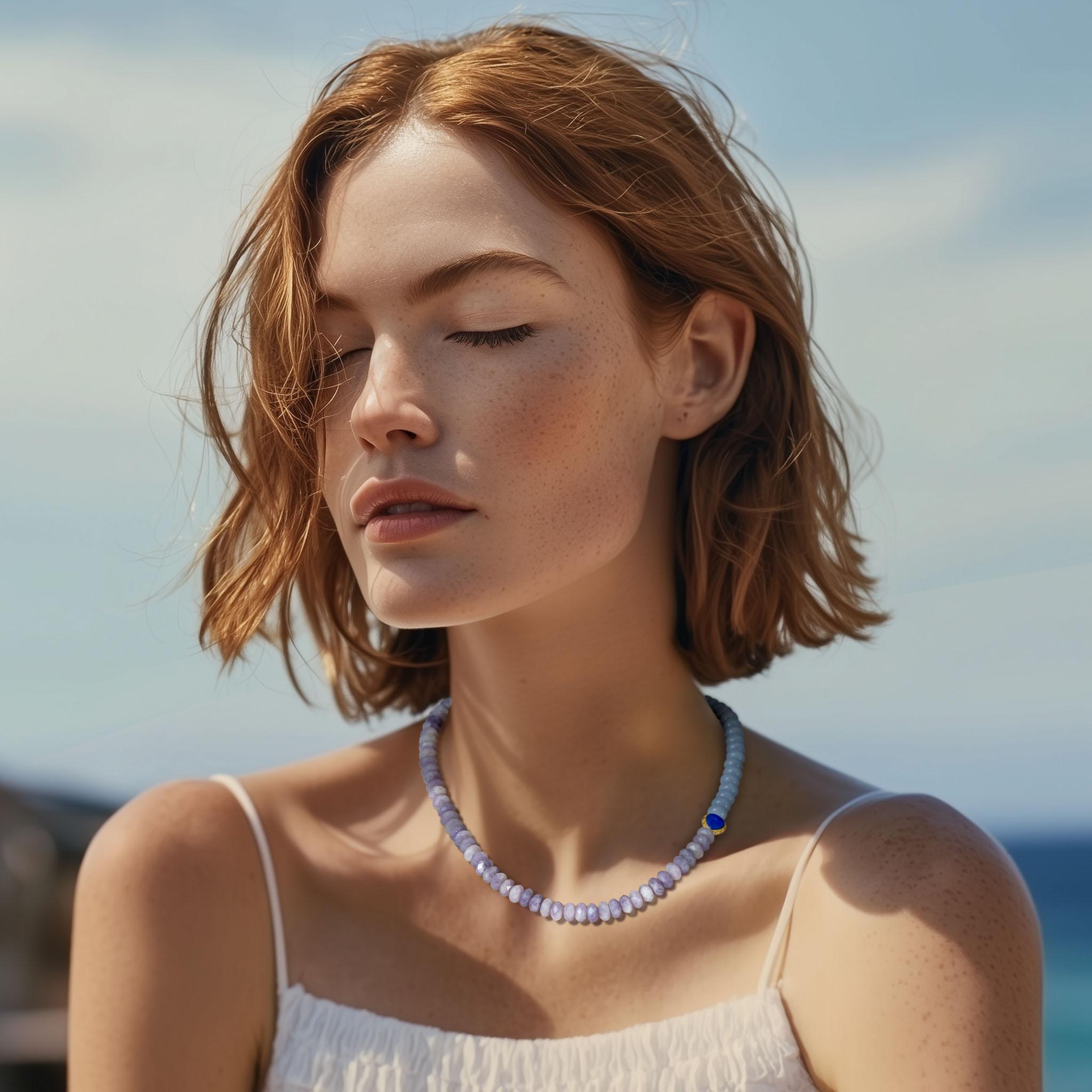 Drape yourself in the gentle whisper of dawn and dusk with this ethereal necklace, where the lavender Kunzite and serene Aquamarine embrace like sky meeting horizon. The brilliant Lapis accent shines like a captured star against this heavenly