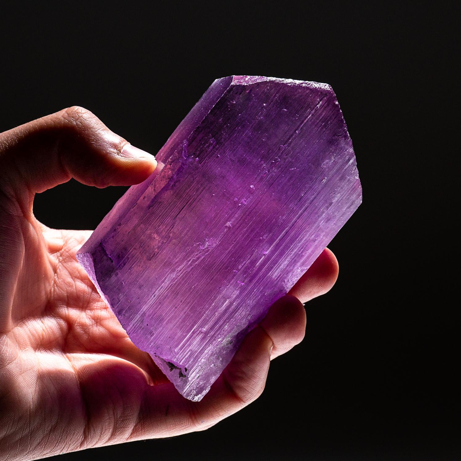 Large single crystal of transparent, pink spodumene Kunzite with steep termination on the top, and complex termination on the bottom.

Kunzite is a beautiful crystal, pure in energy and joyful in nature. In palest pink to light violet hues, it is