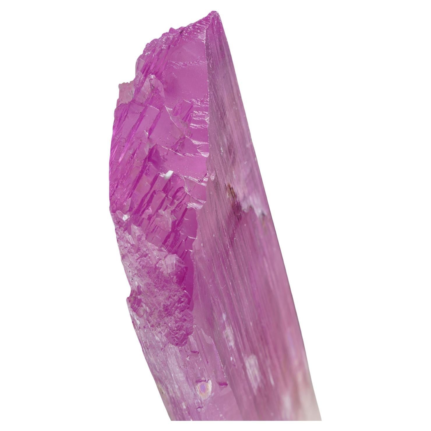 Fully terminated single crystal of transparent gem quality spodumene var. Kunzite. The crystal faces are composed of smaller lustrous parallel crystal faces.

Kunzite is a beautiful crystal, pure in energy and joyful in nature. In palest pink to