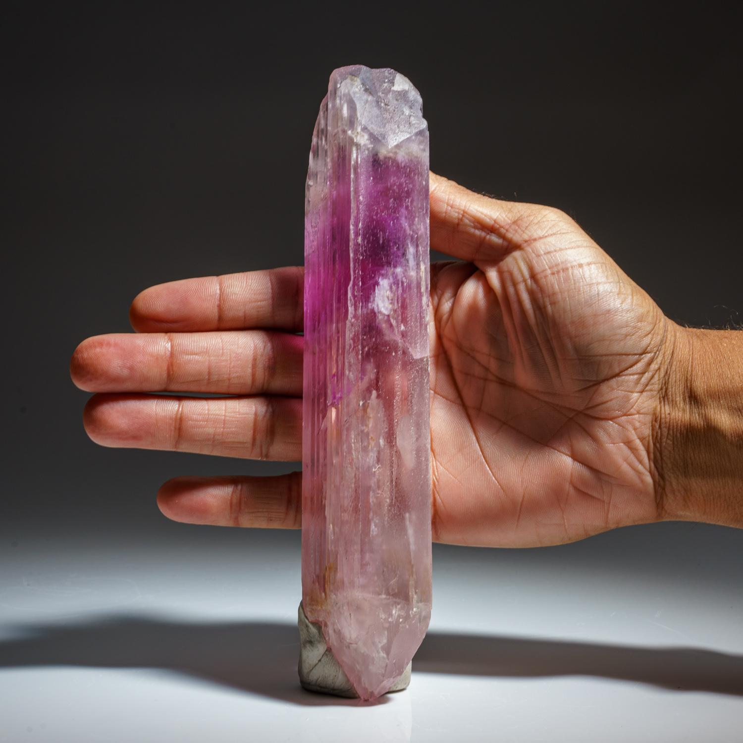 Fully terminated single crystal of transparent gem quality spodumene var. Kunzite. The crystal faces are composed of smaller lustrous parallel crystal faces.

Kunzite is a beautiful crystal, pure in energy and joyful in nature. In palest pink to