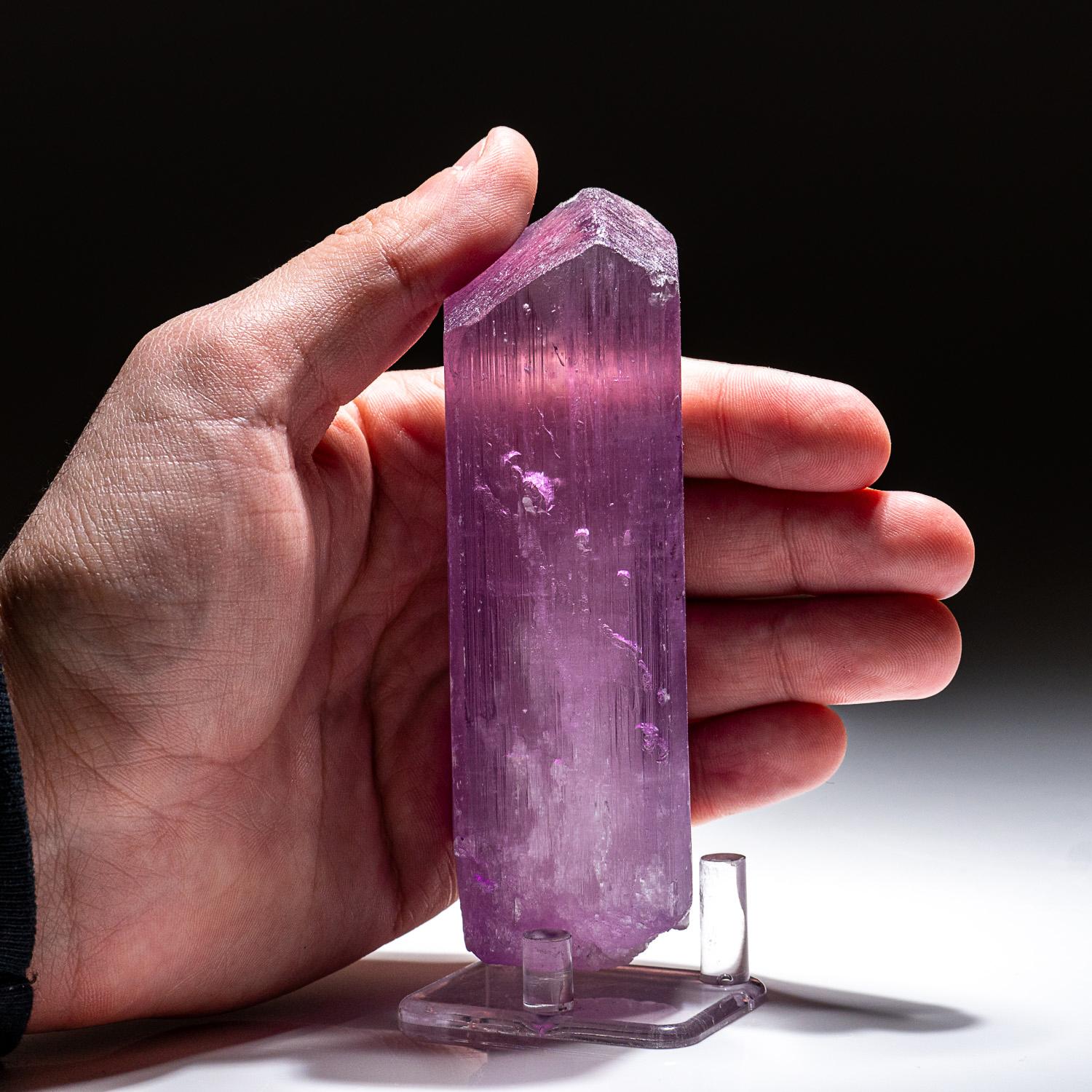 Large single crystal of transparent, pink spodumene Kunzite with with steep termination on the top, and complex termination on the bottom.

Kunzite is a beautiful crystal, pure in energy and joyful in nature. In palest pink to light violet hues,