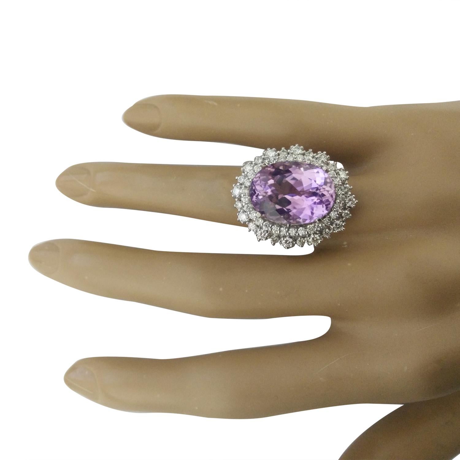 18.58 Carat Natural Kunzite 14 Karat Solid White Gold Diamond Ring
Stamped: 14K 
Ring Size: 7
Total Ring Weight: 9.5 Grams
Kunzite Weight: 16.88 Carat (17.00x13.80 Millimeter)
Quantity: 56
Diamond Weight: 1.70 Carat (F-G Color, VS2-SI1 Clarity
Face