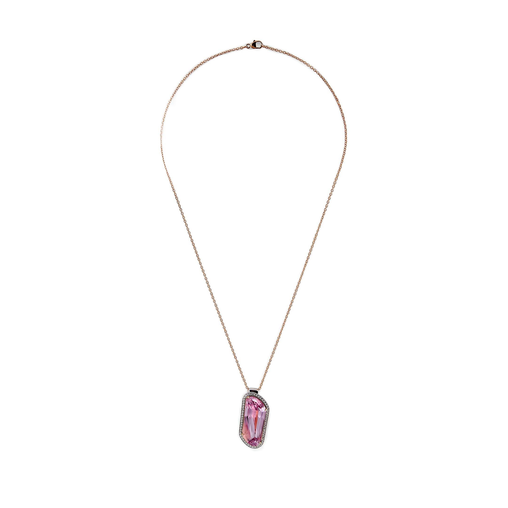 Indulge in the captivating allure of our Kunzite Pendant Necklace, a masterpiece of elegance and charm. 
Crafted with the finest materials, this necklace showcases a combination of 18-karat white gold and rose gold, ensuring durability and lasting